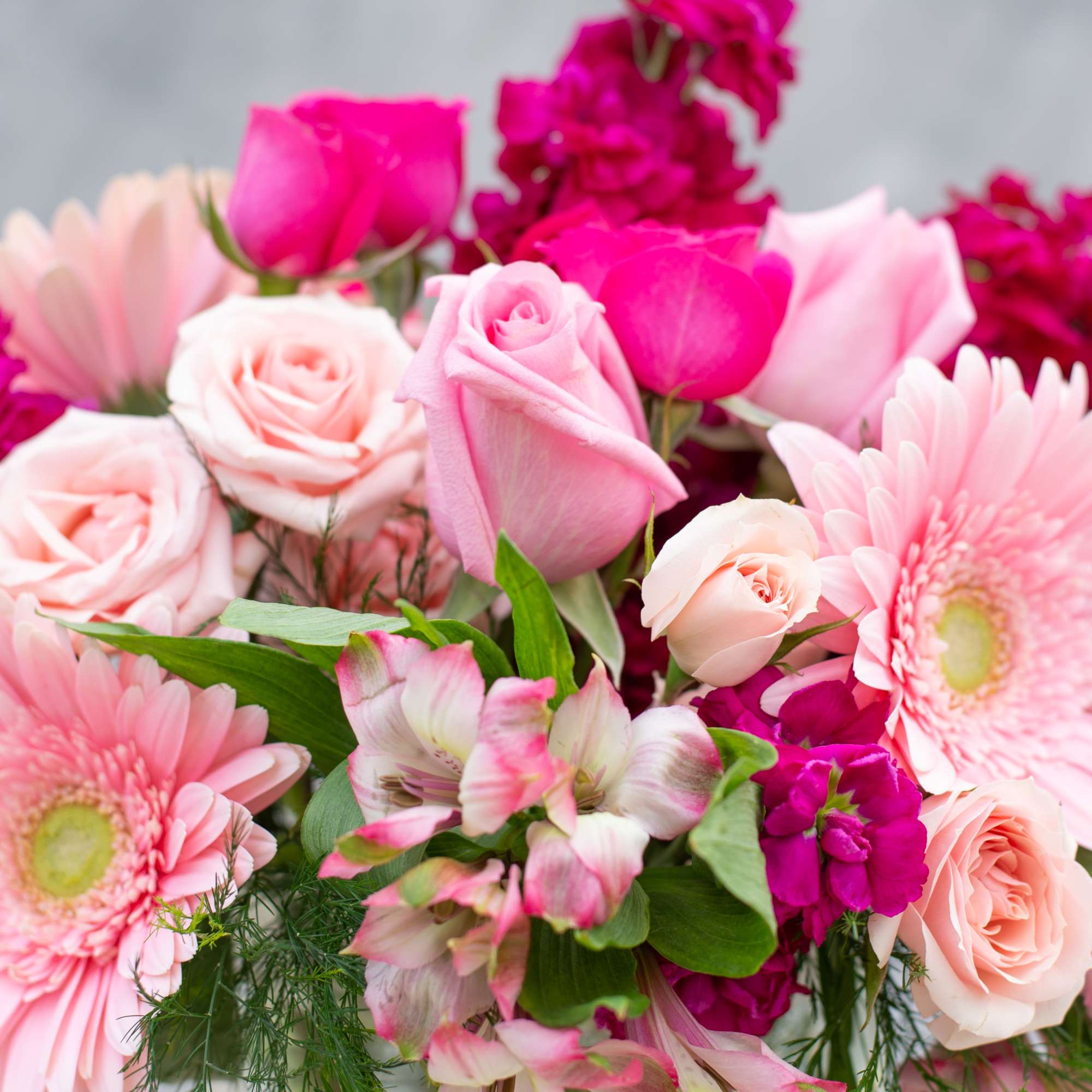 Pink and white bouquet with roses, gerbera daisies, and alstroemeria