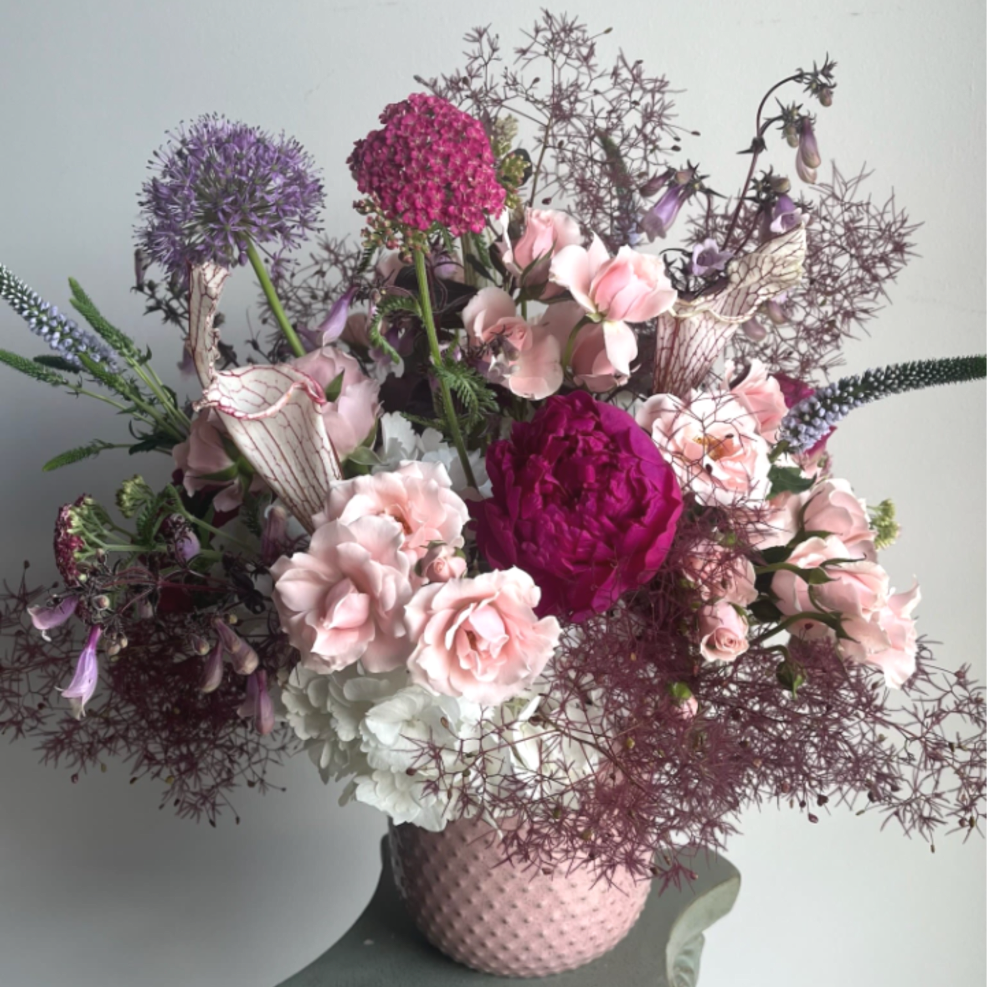 A graceful blend of soft blush and rich rosy pink blooms, Lady