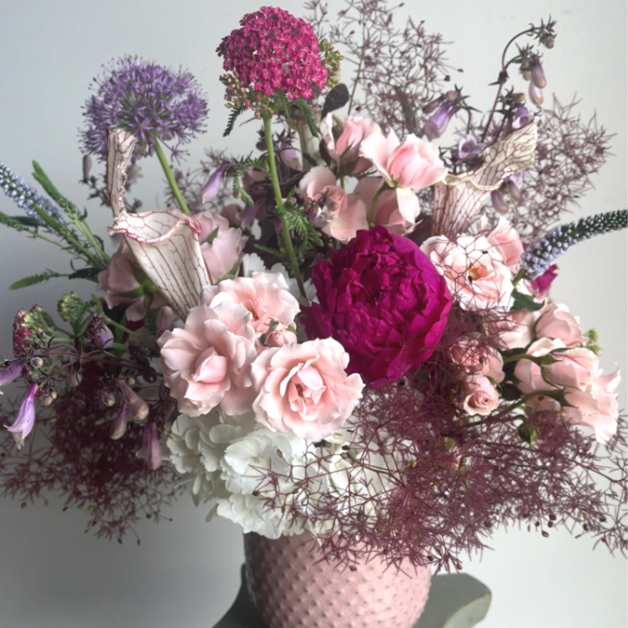 A graceful blend of soft blush and rich rosy pink blooms, Lady