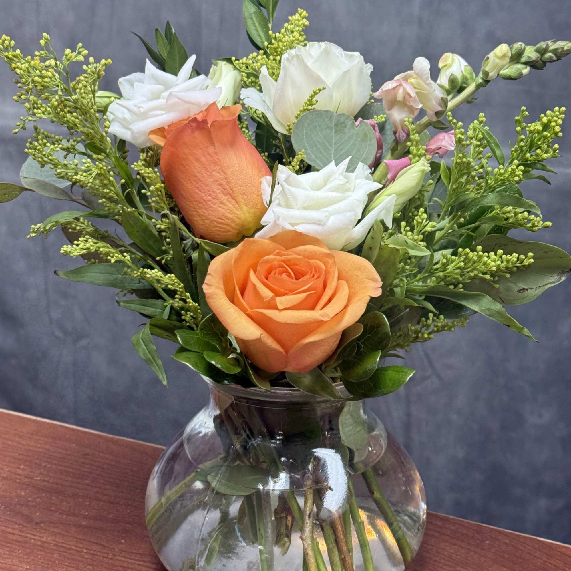 A cheerful burst of color that brightens any space! 
Featuring vibrant orange