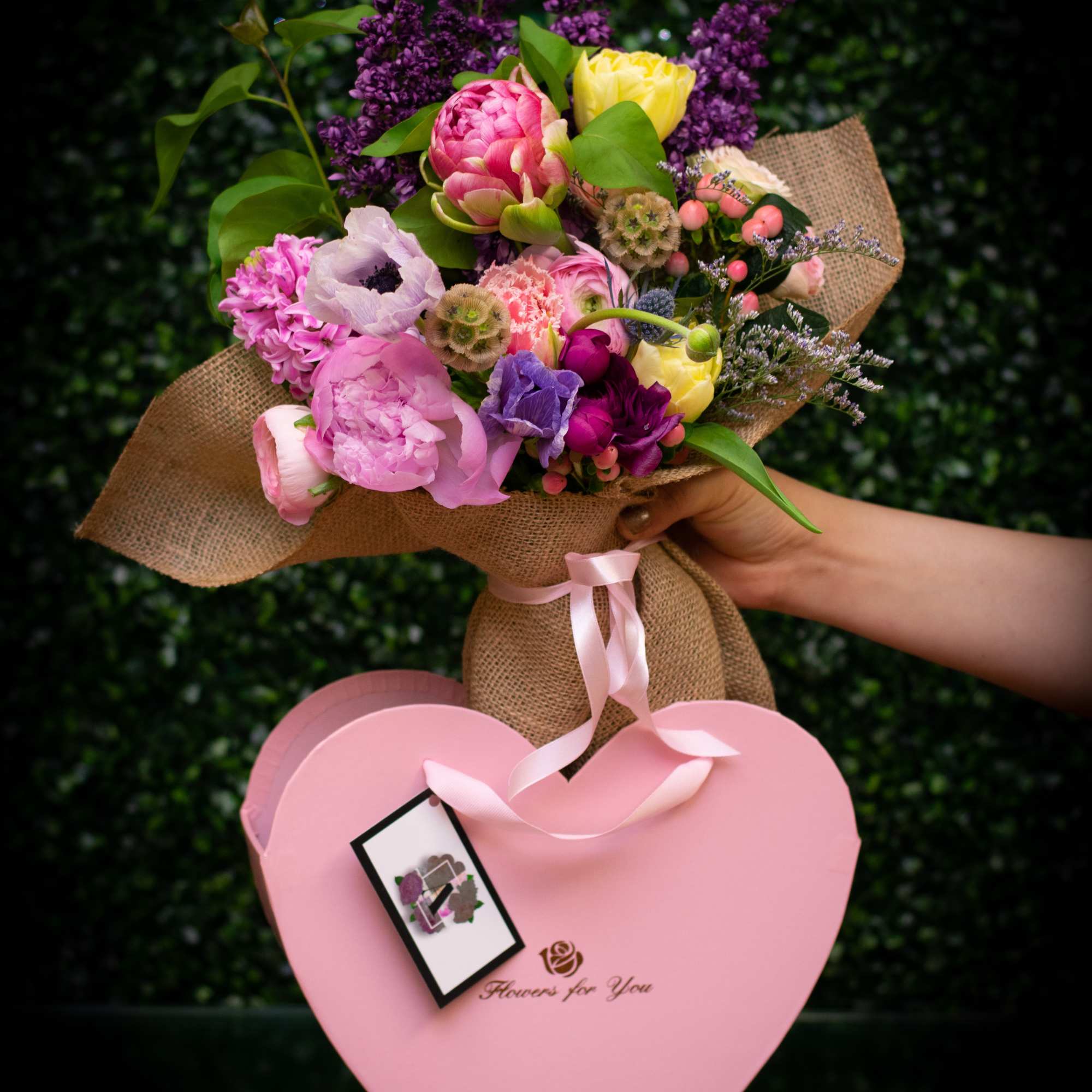 A beautiful custom designed bouquets  with assorted high end flowers. 