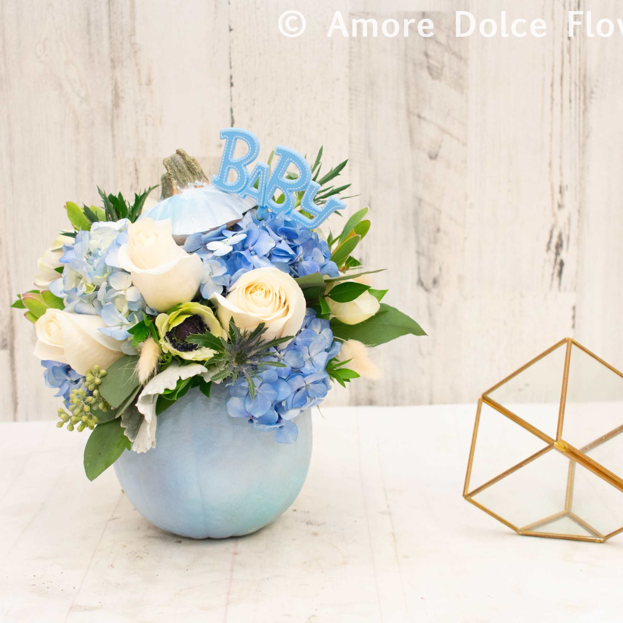 Please note that the price includes only one arrangement. This picture is