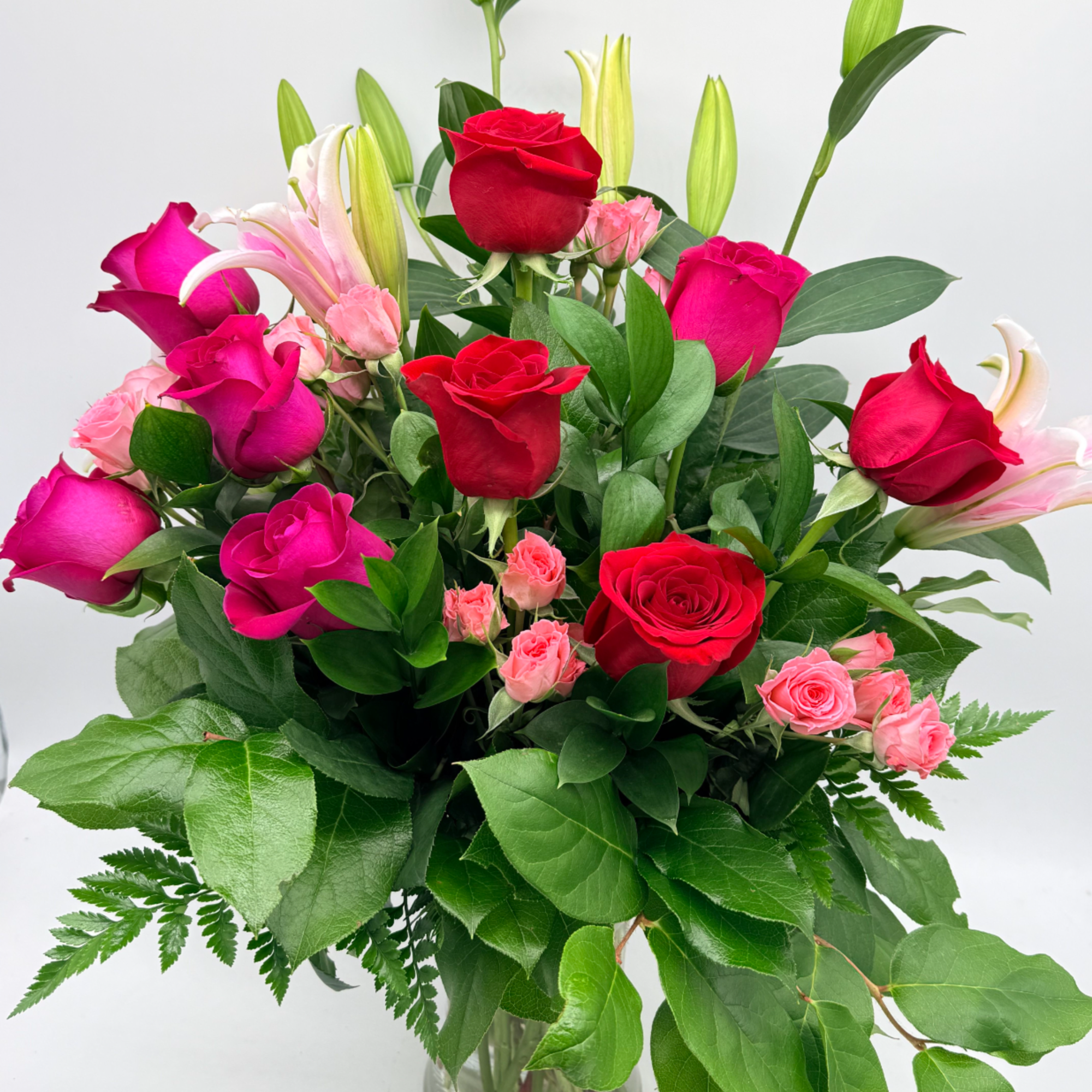 A dreamy mix of passionate reds and sweet pink florals designed to
