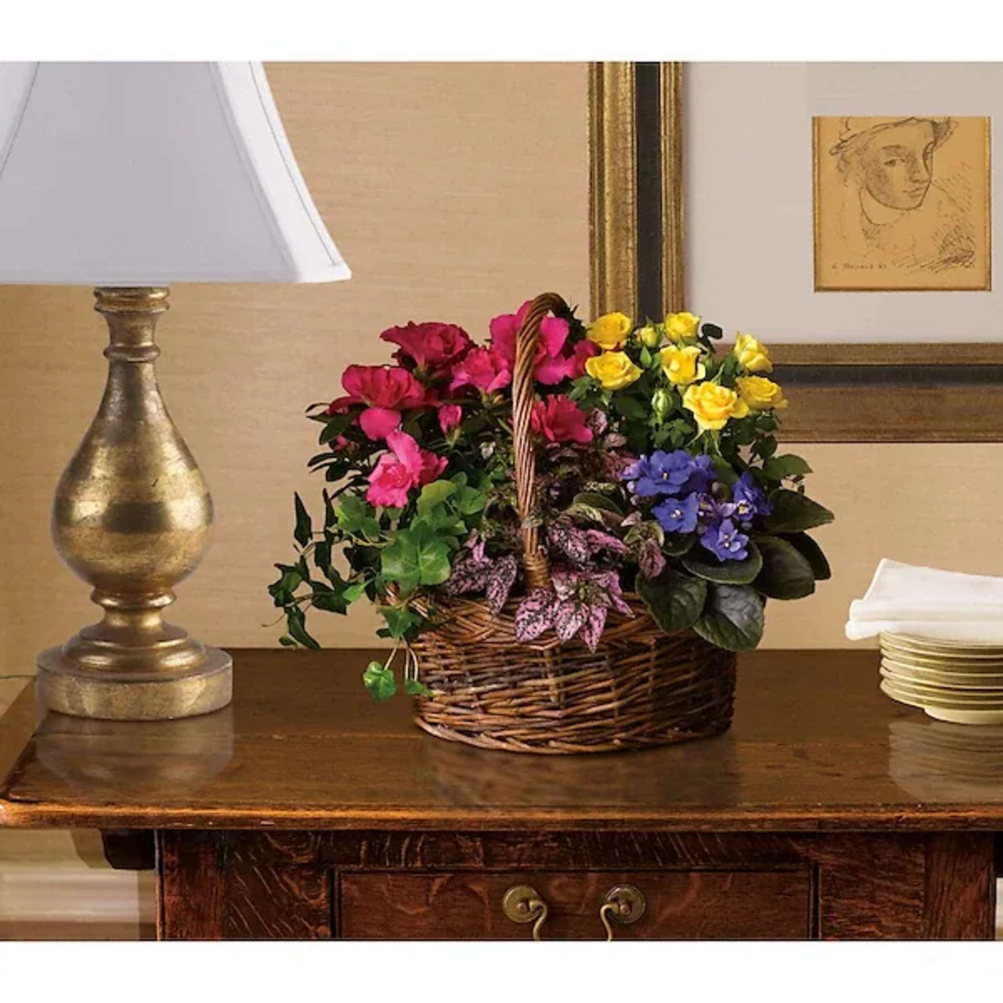 Basket of colorful mixed flowers on a table