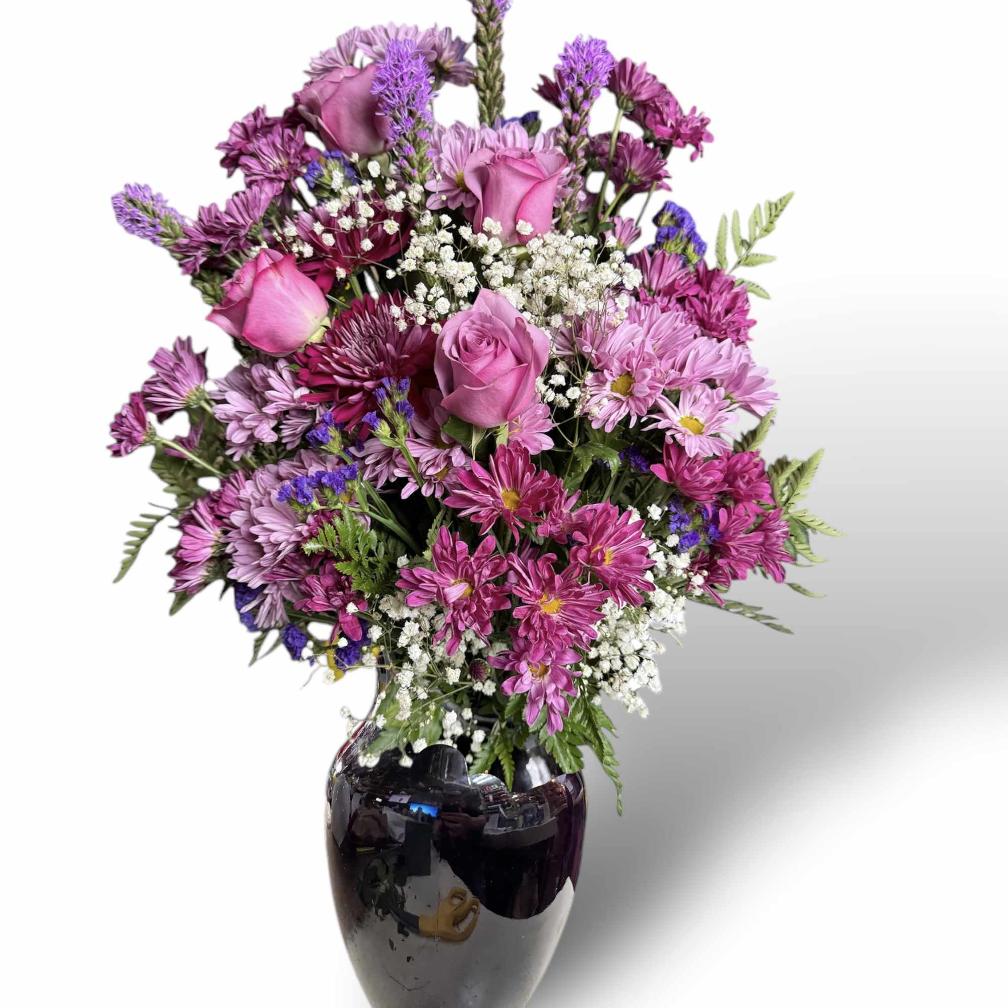 Purple elegance vase  
in a purple vase filled with purple and