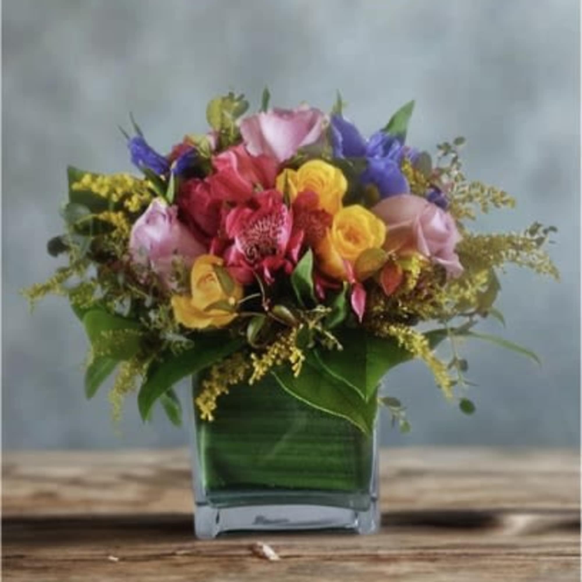 Garden Parade Arrangement &ndash; A Celebration of Color
Bring the joy of a