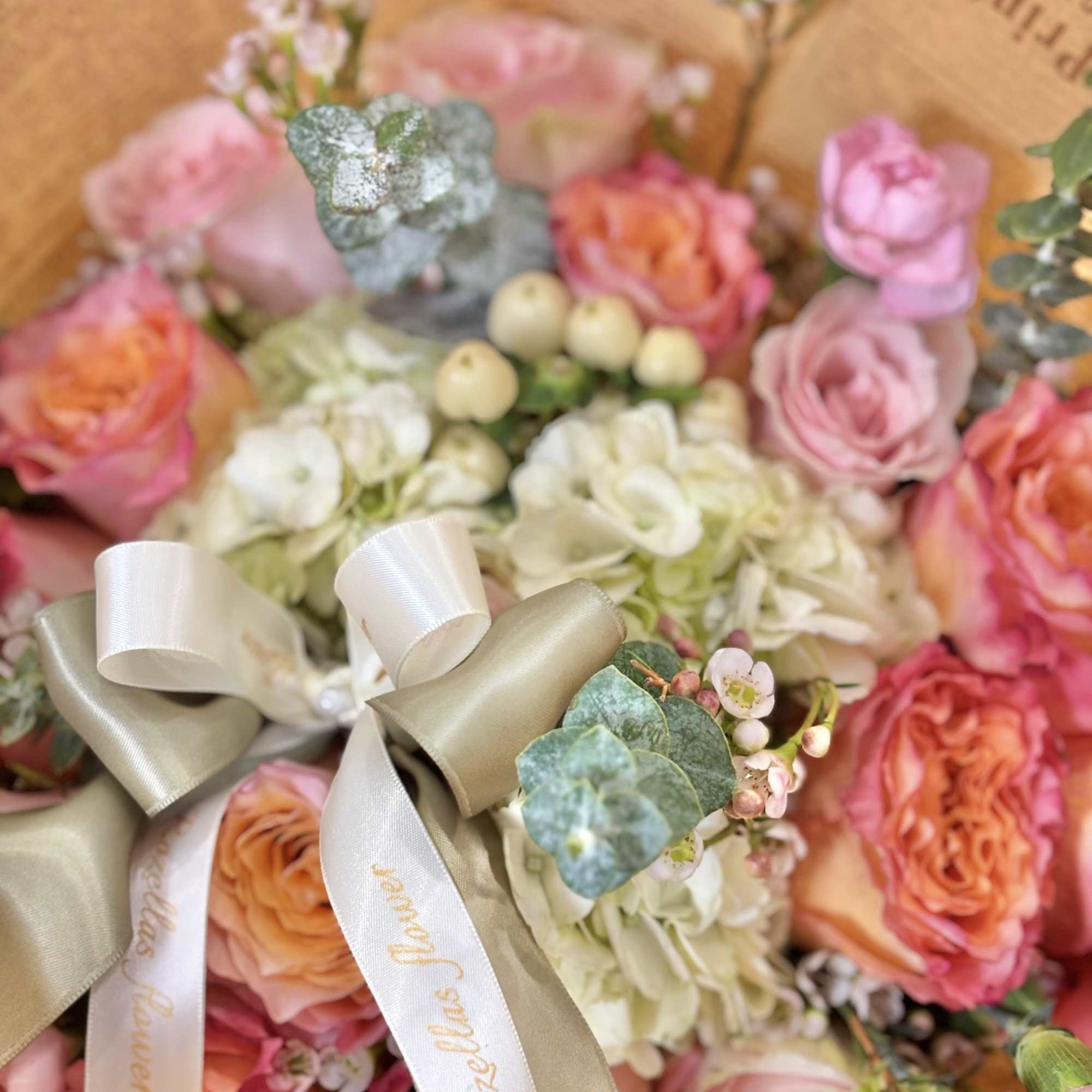 Mix of flowers in stock, wrapped in news paper.