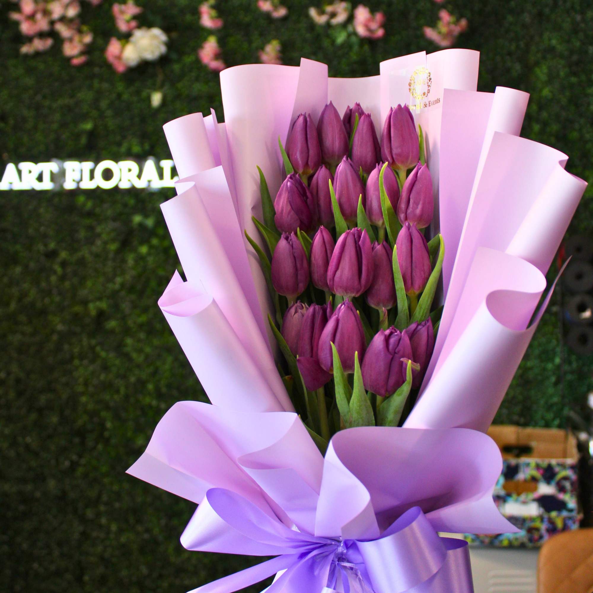 20 Tulips Wrapped in lux waterproof with matching wrapping. 
*VASE INCLUDED*