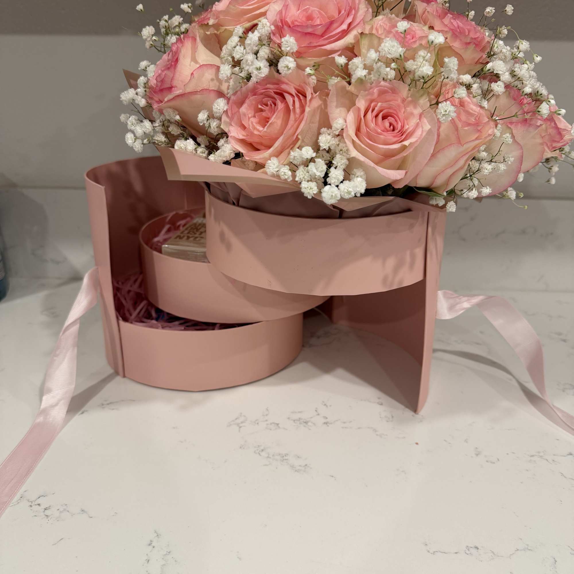 Pink rose bouquet in a blush gift box with white baby's breath