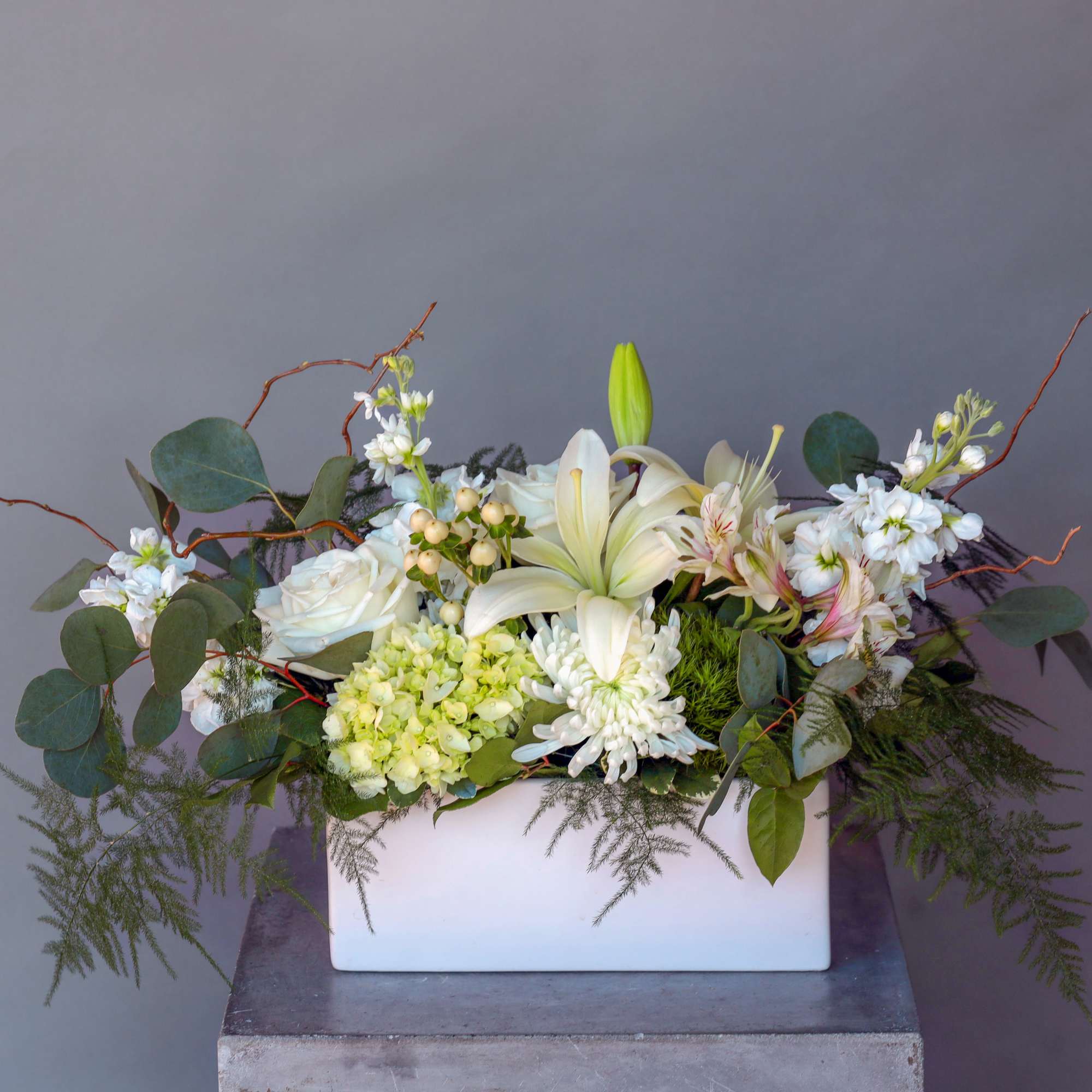 Express your deepest condolences with the serene beauty of the "Comforting Wishes"