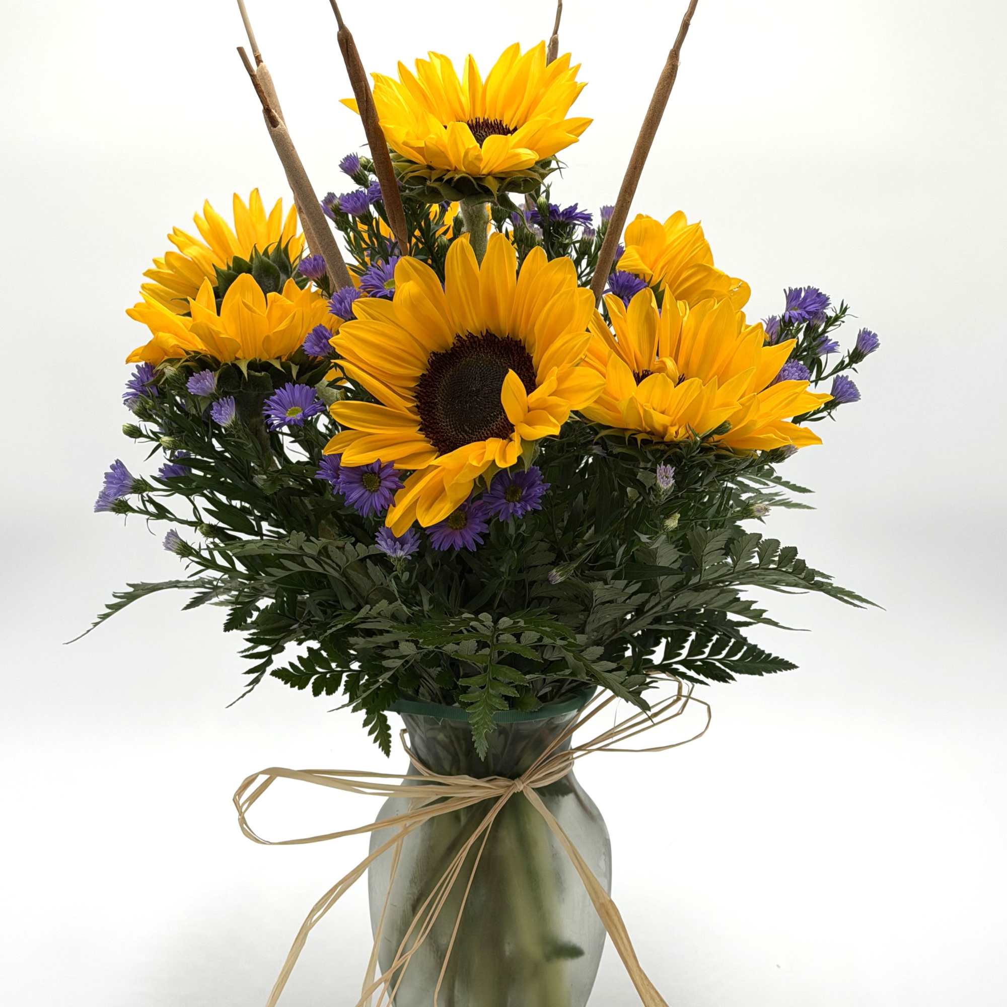 Bask in the warmth of sunny sunflowers, the focal point of this