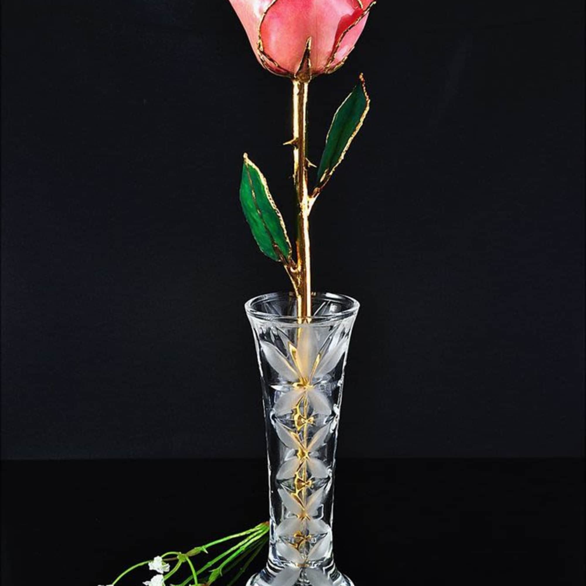 A real rose preserved to last and then trimmed with real 24kt