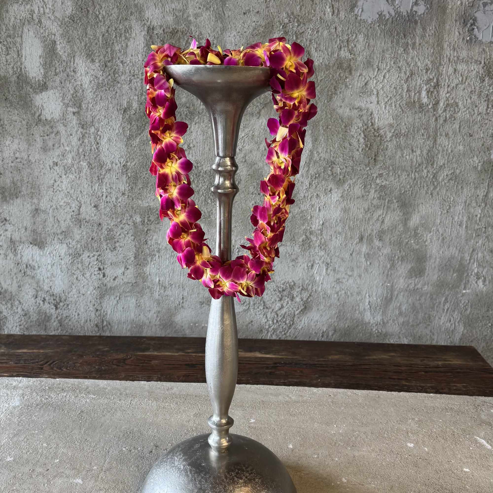 Fresh double orchid leis for any occasion! Available after 5/14/26.

Various colors available.