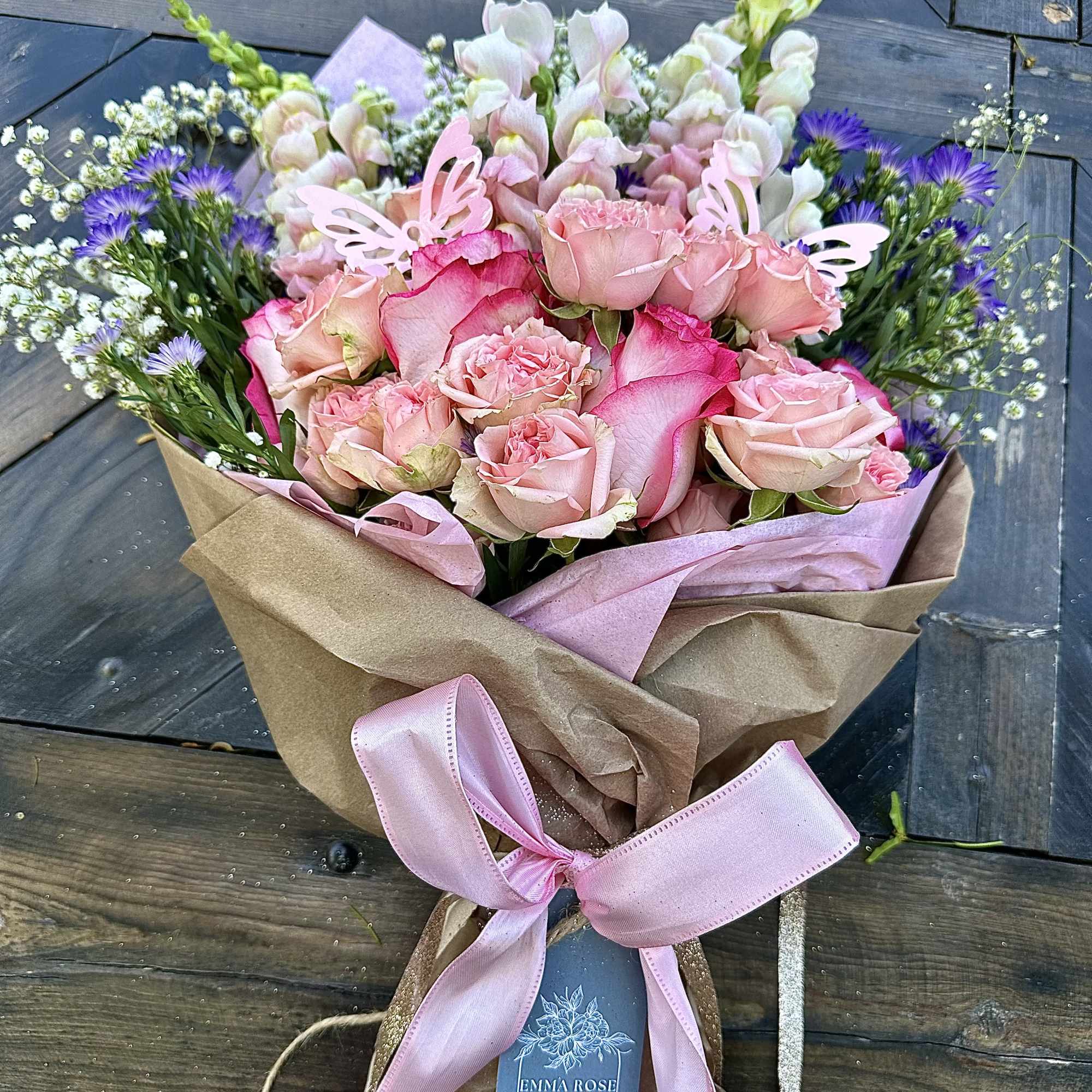 A gorgeous large bouquet of seasonal blooms filled with a variety of