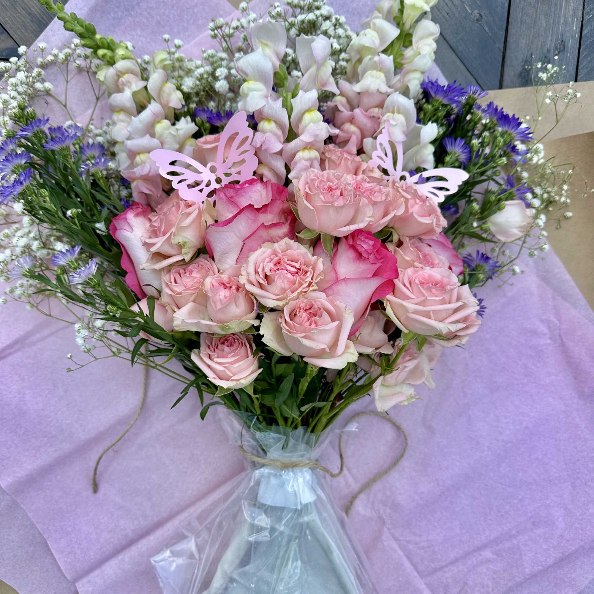 A gorgeous large bouquet of seasonal blooms filled with a variety of