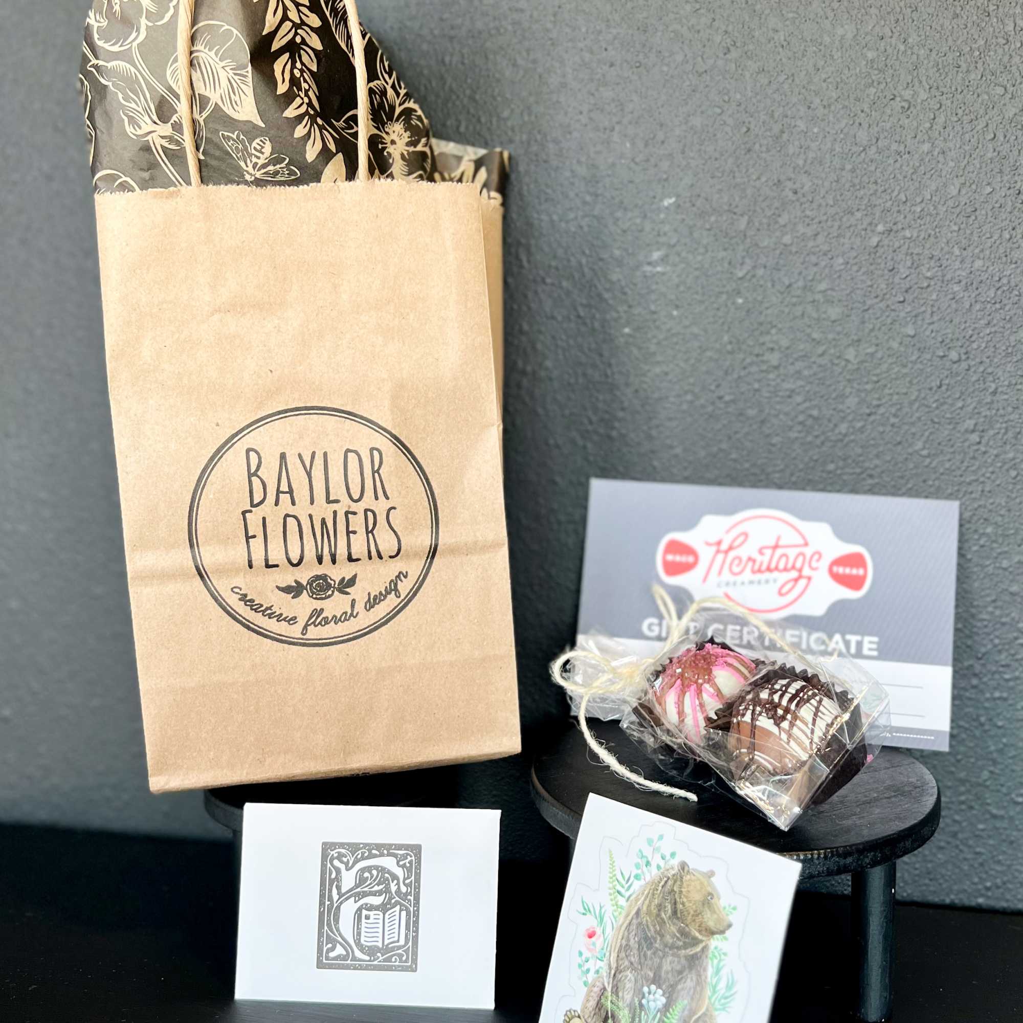 Gift bag with chocolates, cards, and a gift certificate