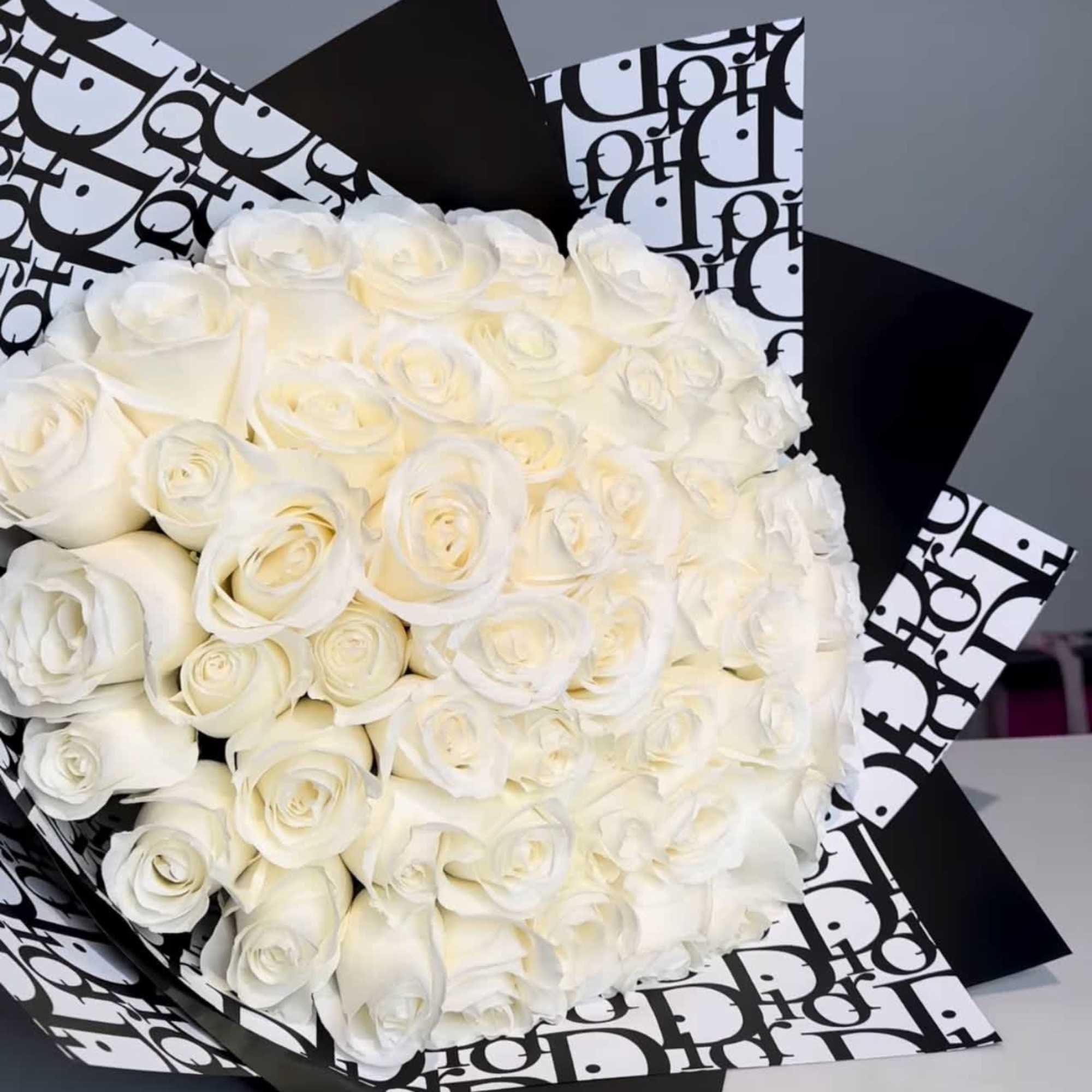 For classic romance two dozen white roses is always the perfect choice.