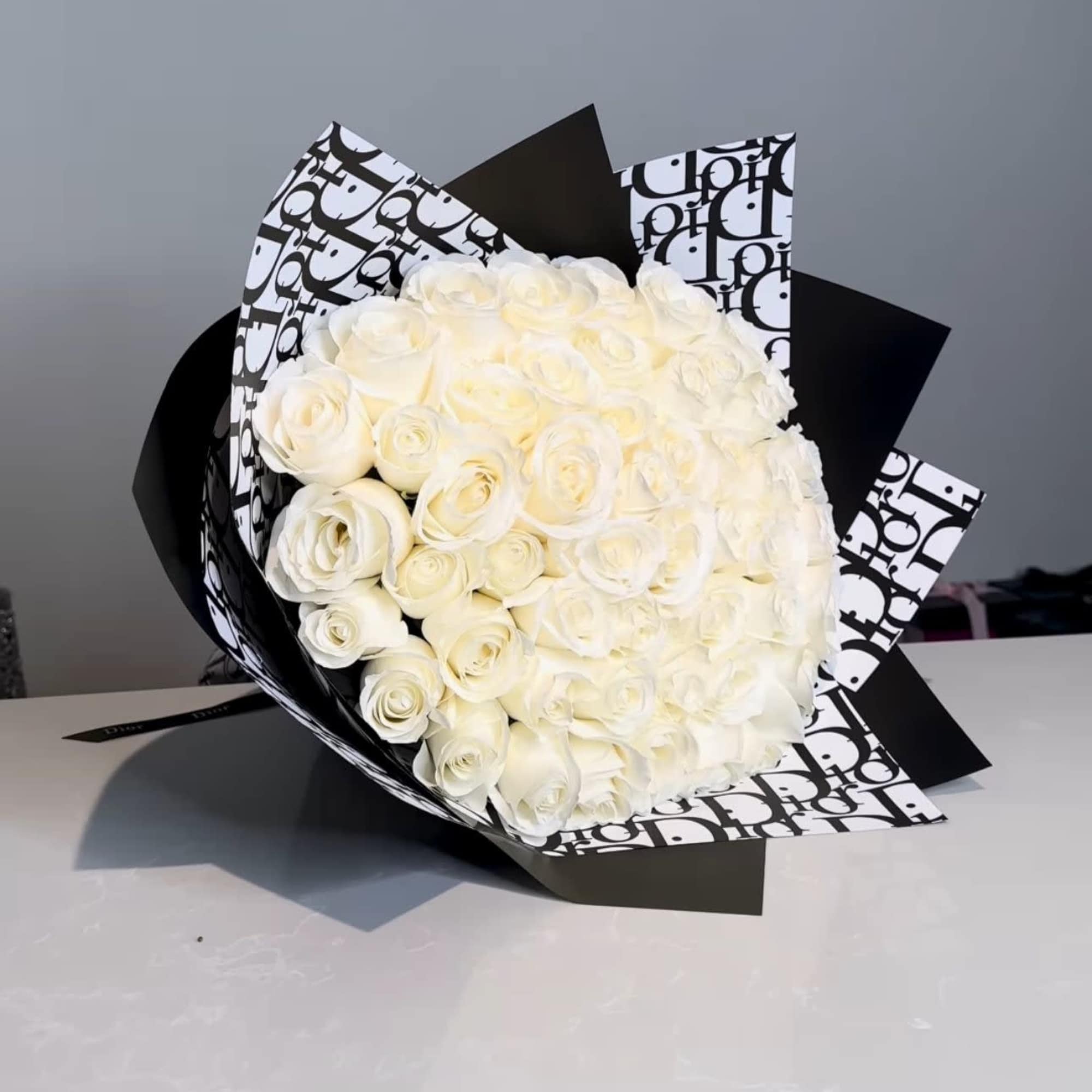 For classic romance two dozen white roses is always the perfect choice.