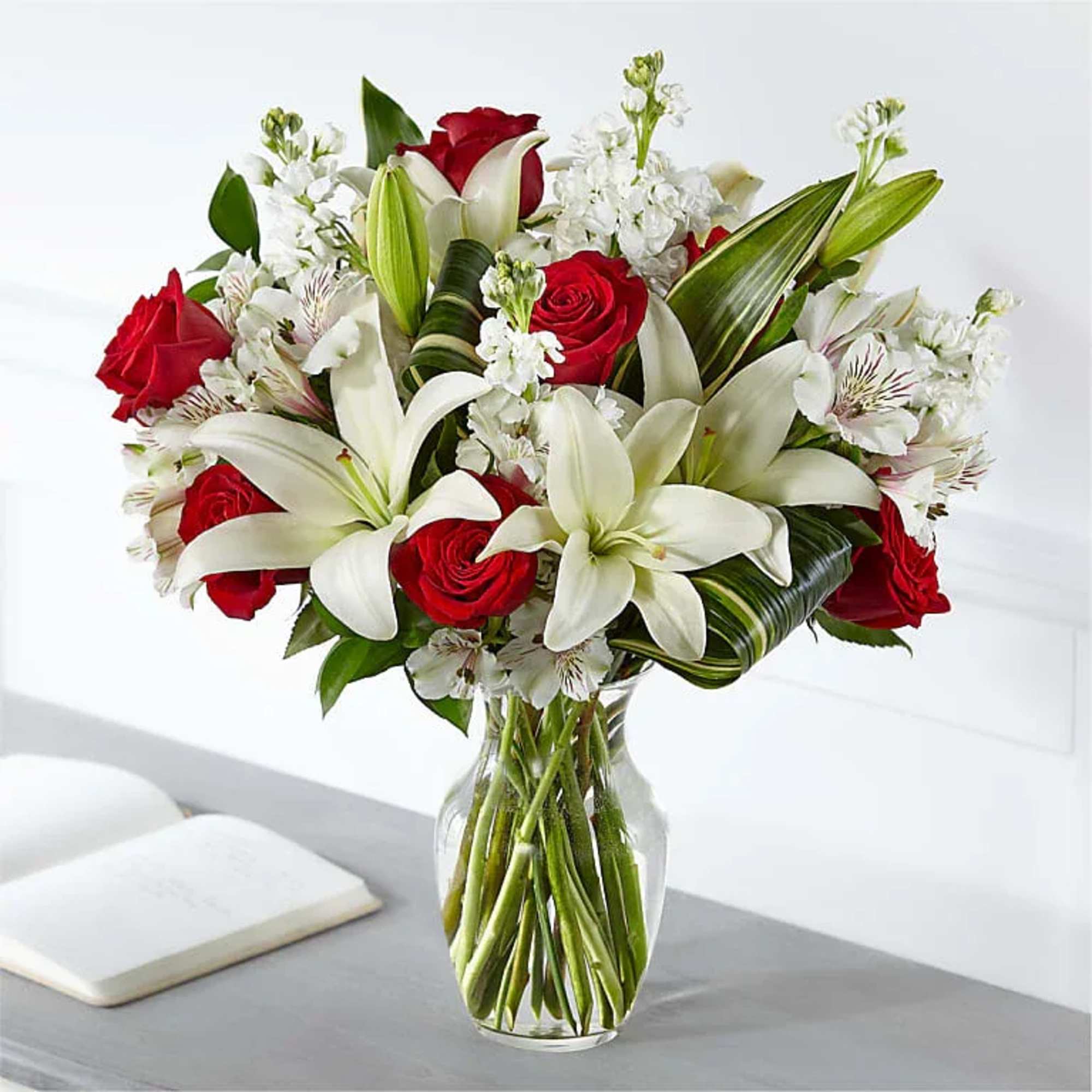 Elegantly crafted with a stunning mix of red and white blooms, our