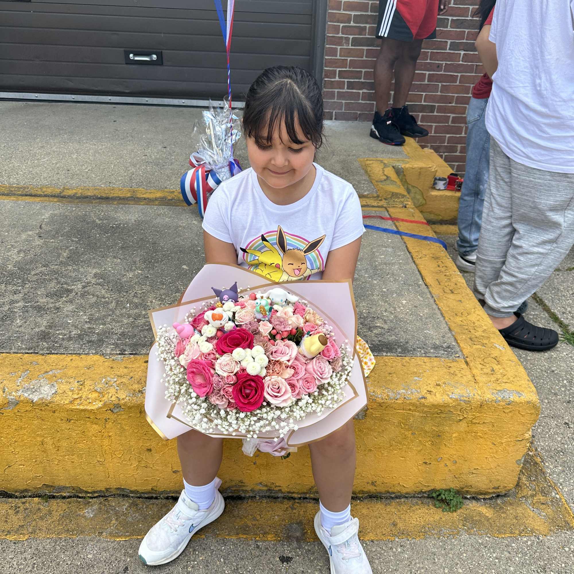 Arreglo de flores para graduaci&oacute;n de ni&ntilde;as personalizado en Long Island New