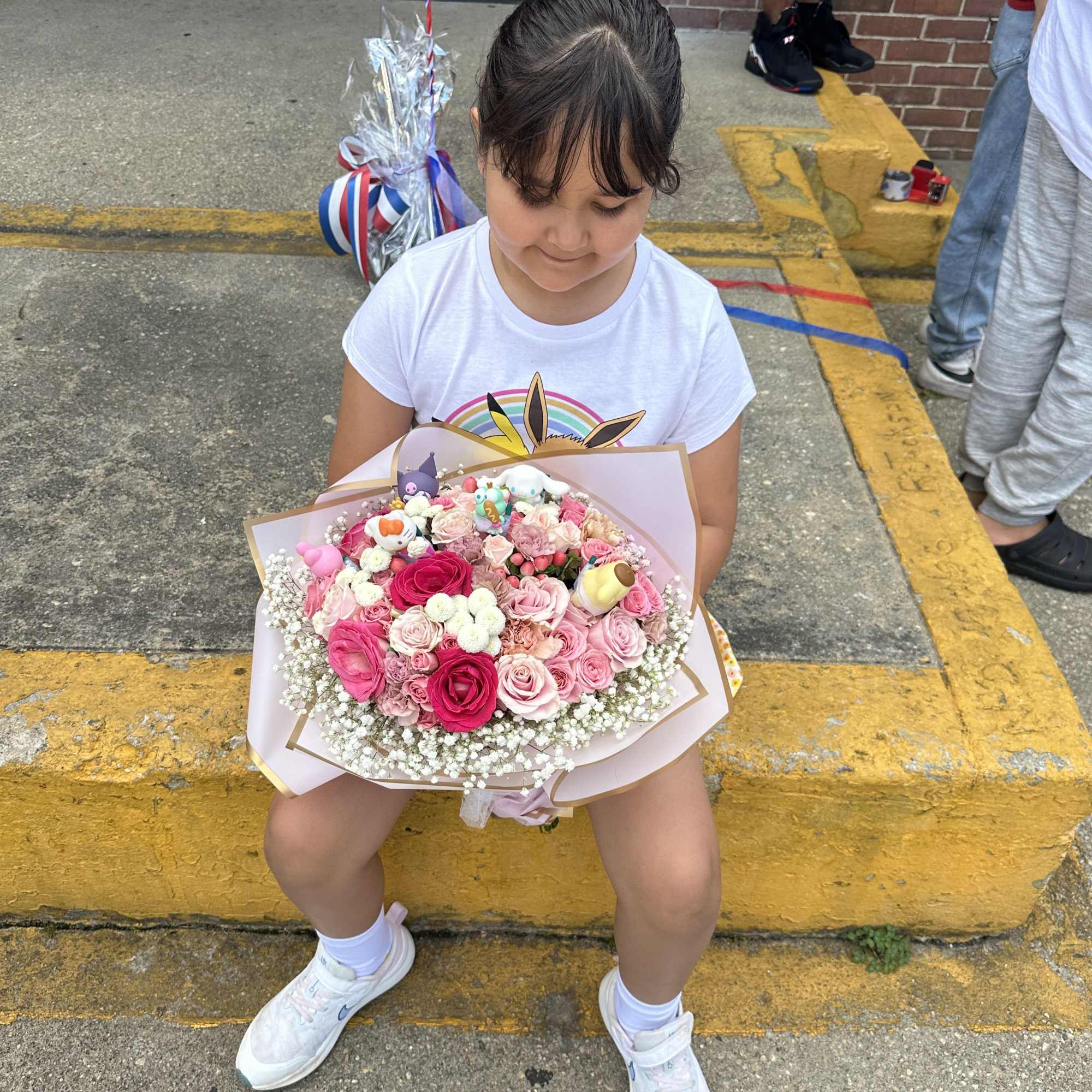 Arreglo de flores para graduaci&oacute;n de ni&ntilde;as personalizado en Long Island New