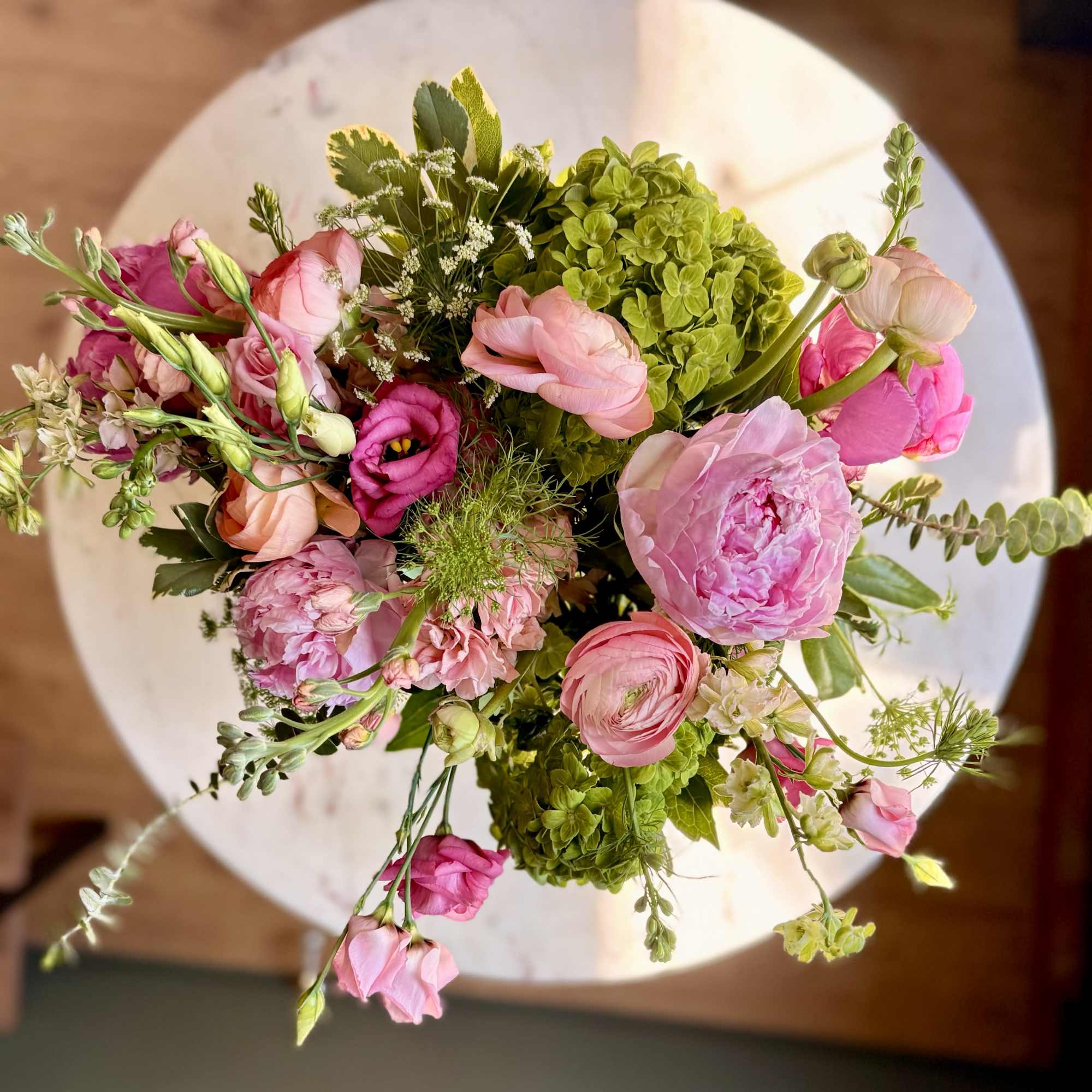 Lowcountry Garden is a lush, low-profile floral arrangement designed in a clear