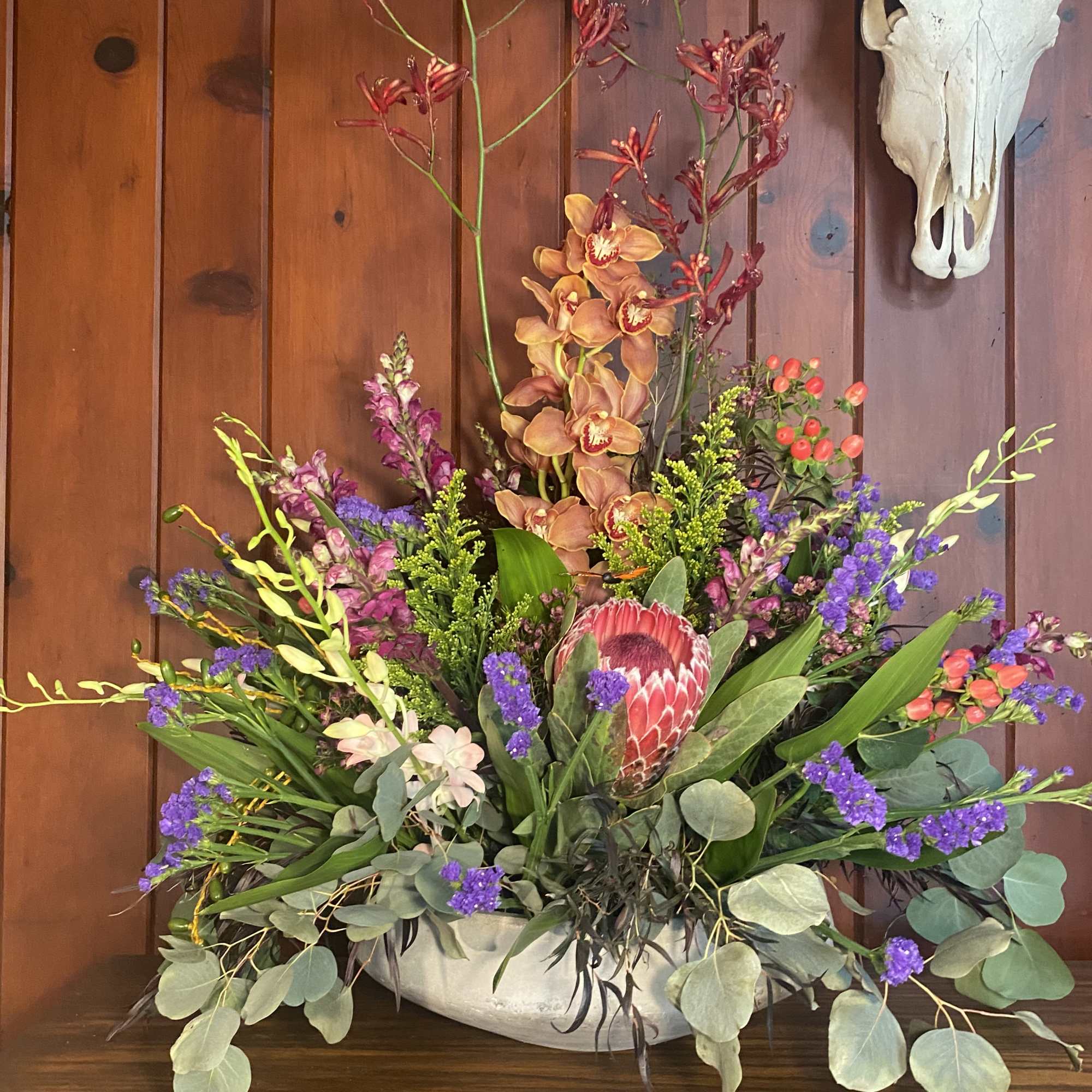 A overwhelmingly large display of beautiful fresh cut flowers arranged in a