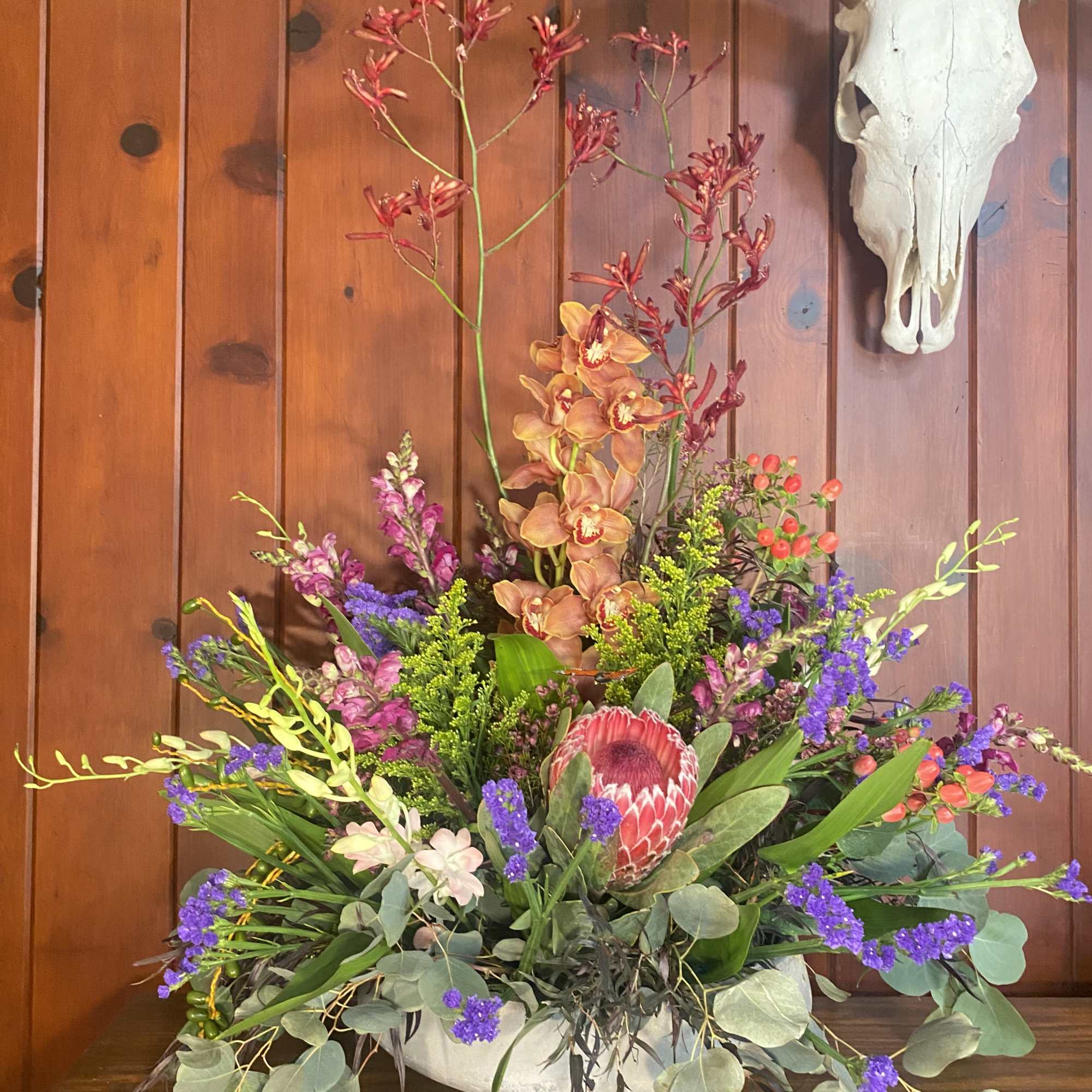 A overwhelmingly large display of beautiful fresh cut flowers arranged in a