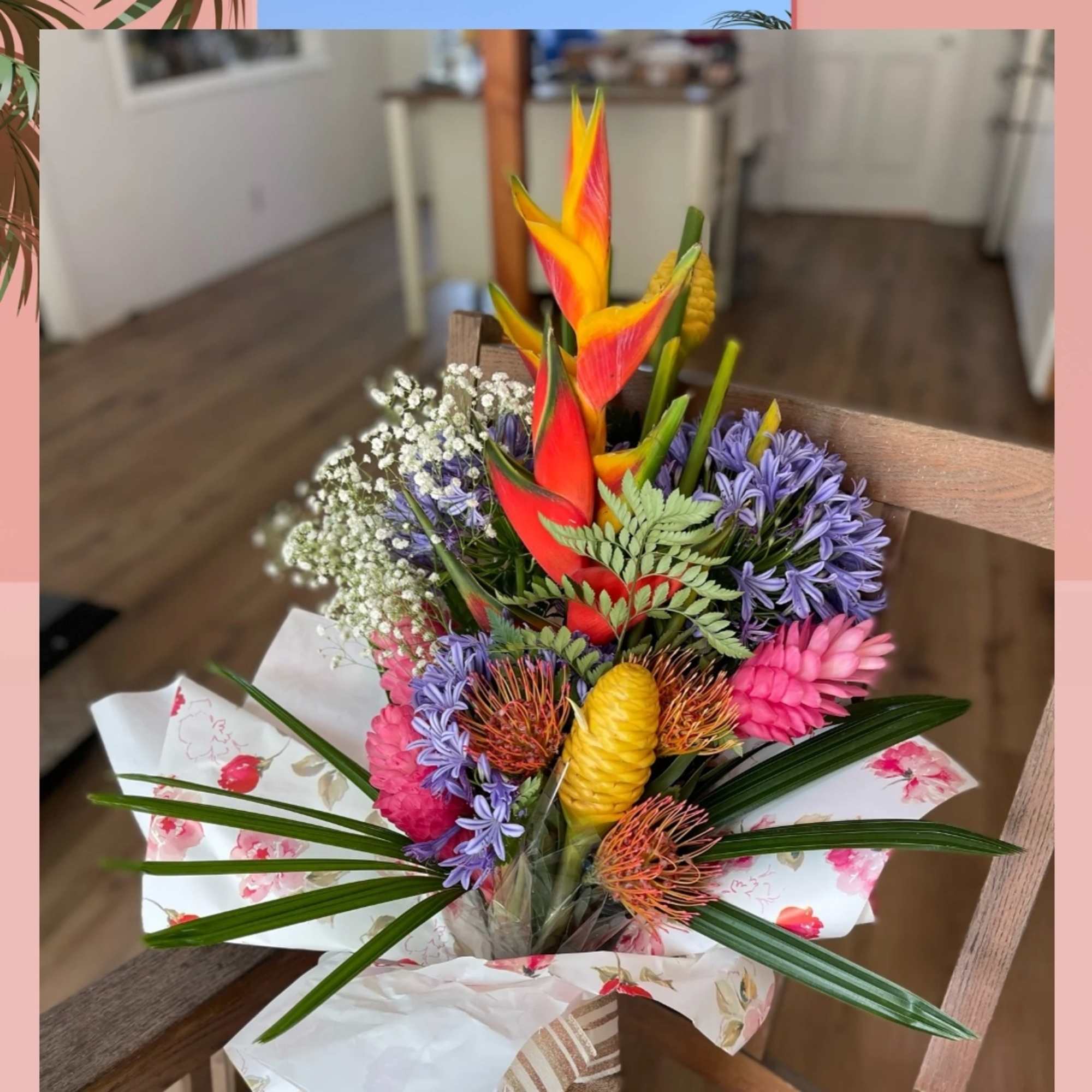 This impressive  mix of tropical florals and exotic greenery  This