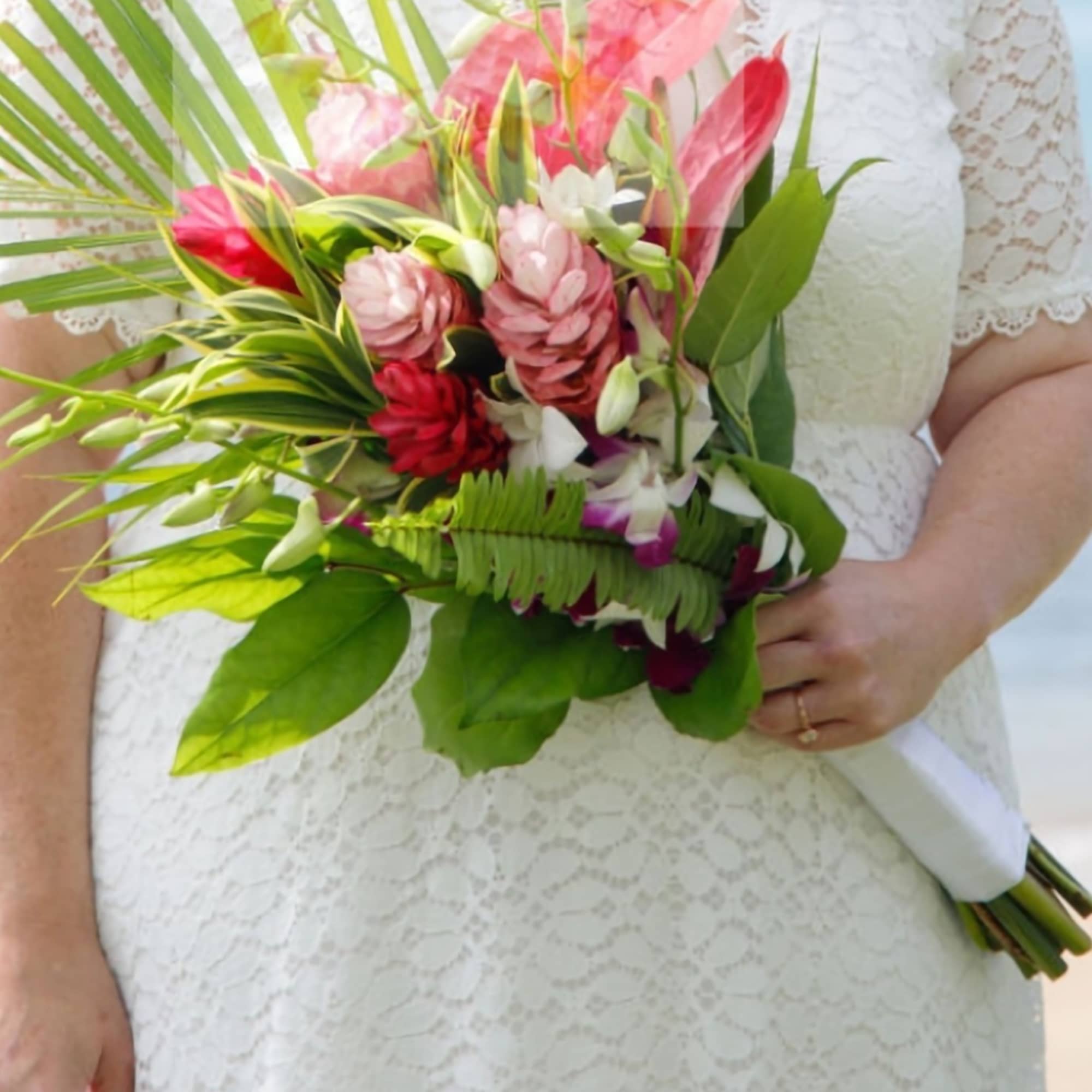 This impressive  mix of tropical florals and exotic greenery  This