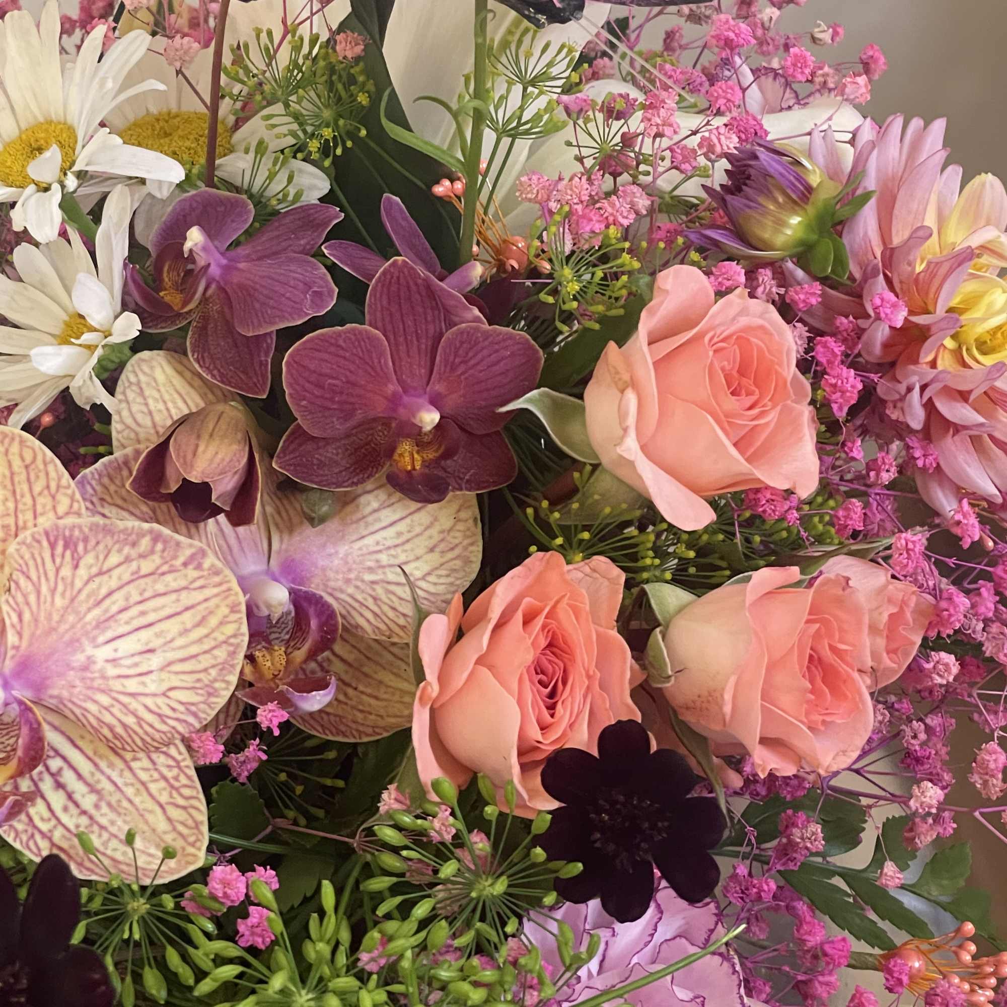 This mixed floral arrangement is perfect for any dining room table 