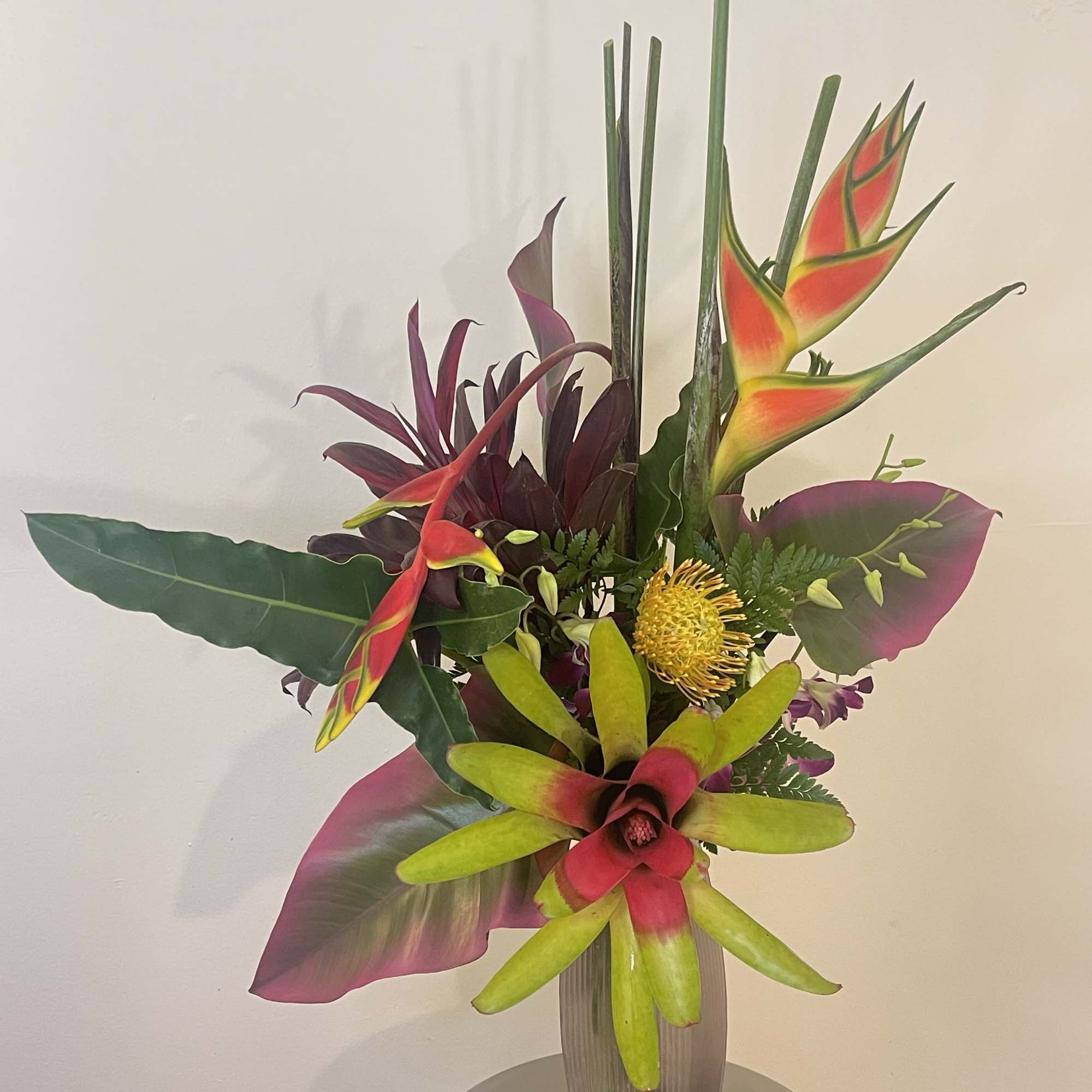 This tropical Zen arrangement will fascinate you with our exotic blooms 