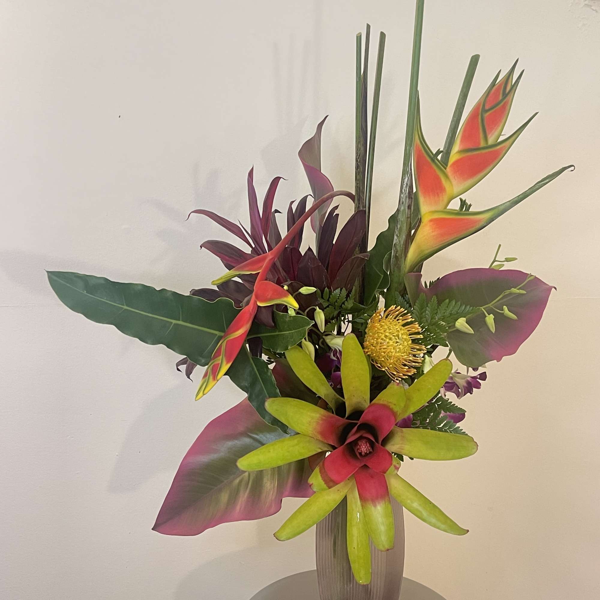 This tropical Zen arrangement will fascinate you with our exotic blooms 