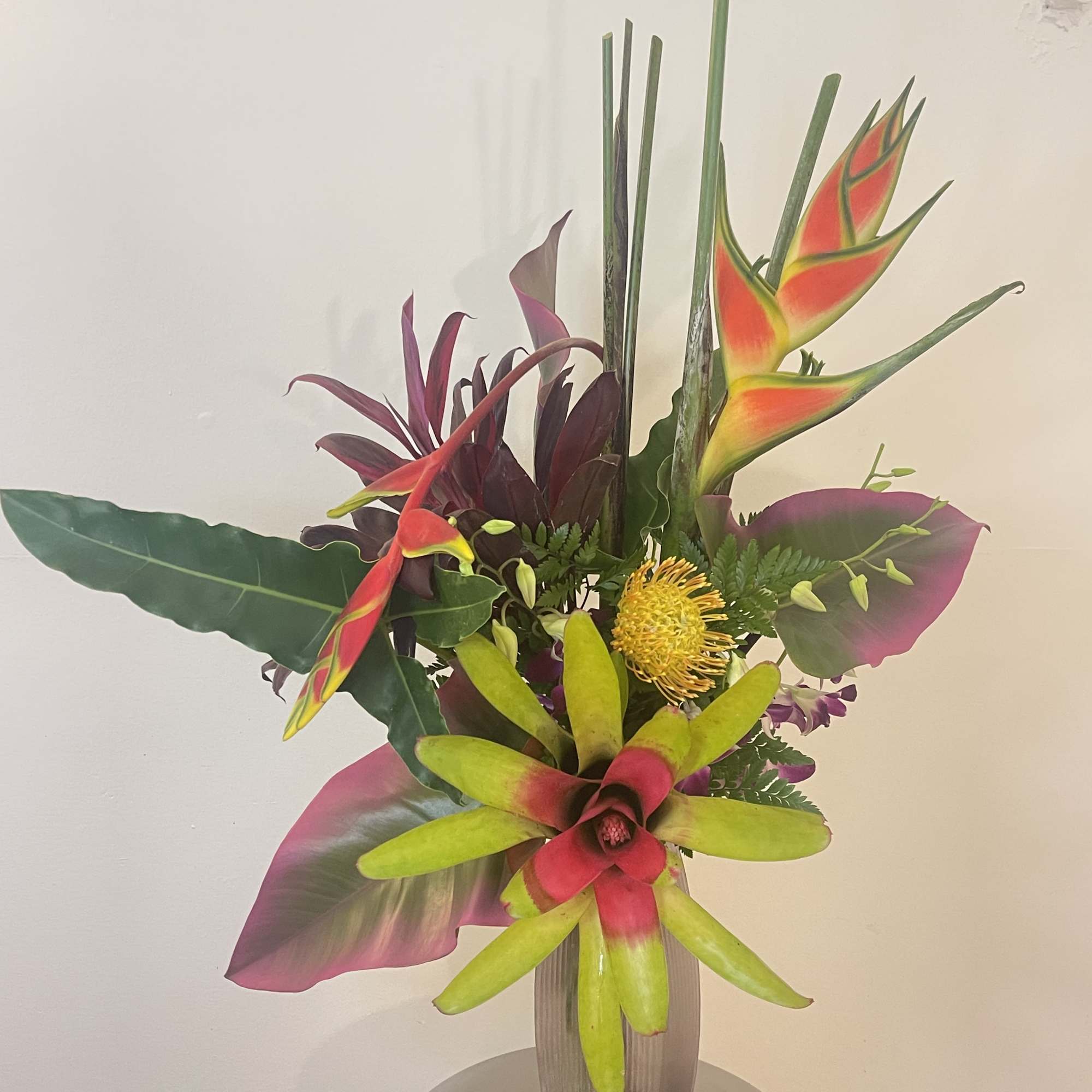 This tropical Zen arrangement will fascinate you with our exotic blooms 