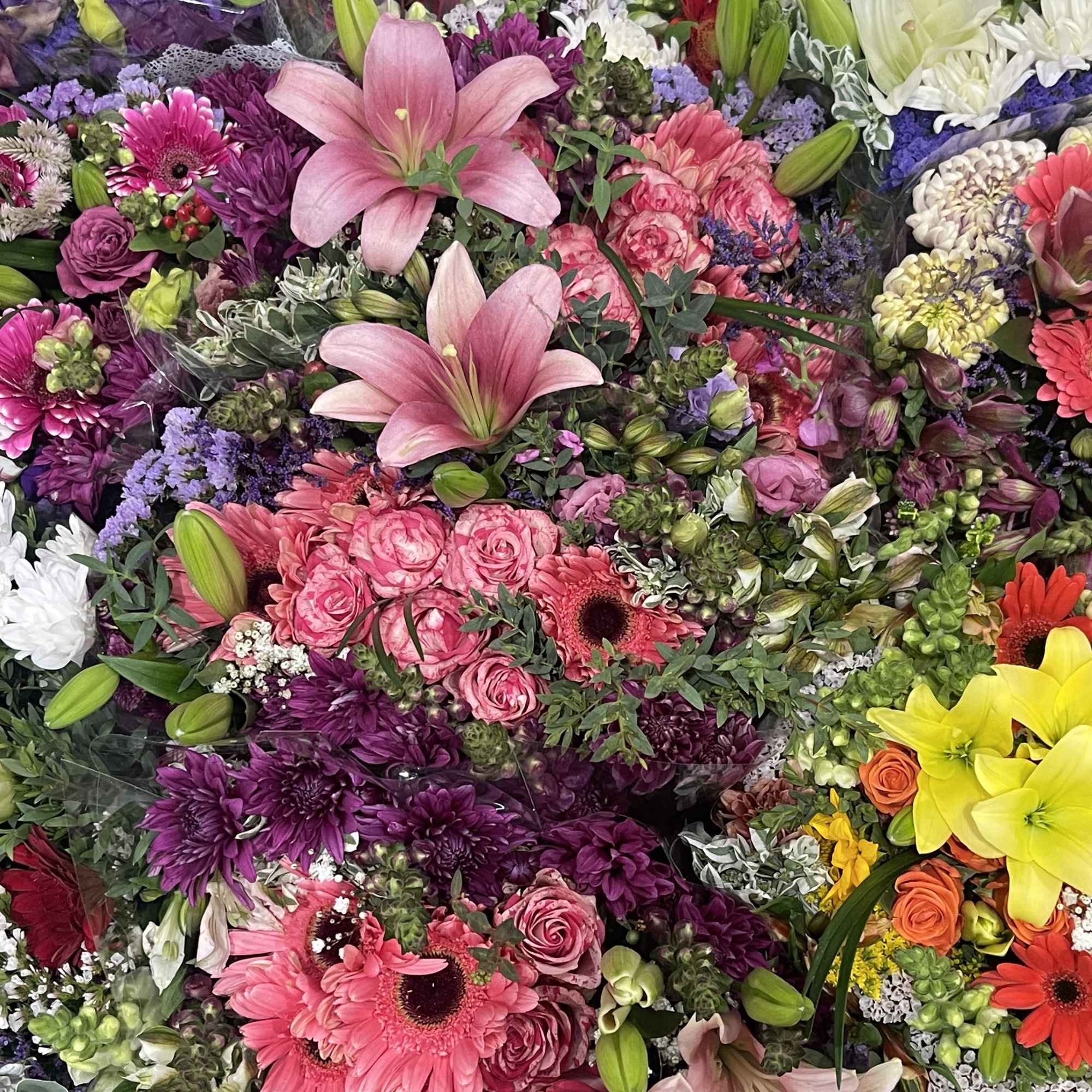 Pink purple white  Mix of cut flowers    