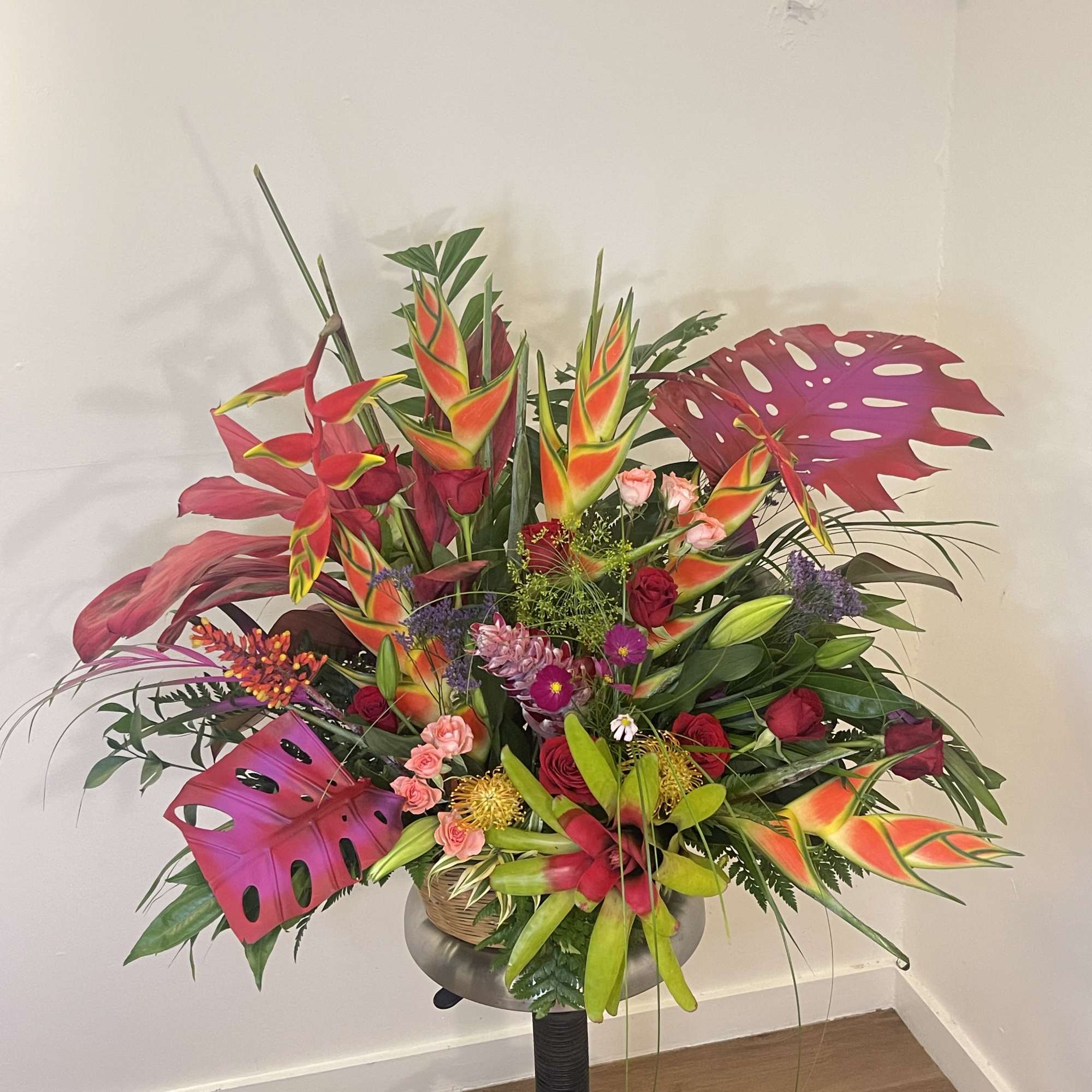 This exotic display of tropical blooms will blow your loved ones away