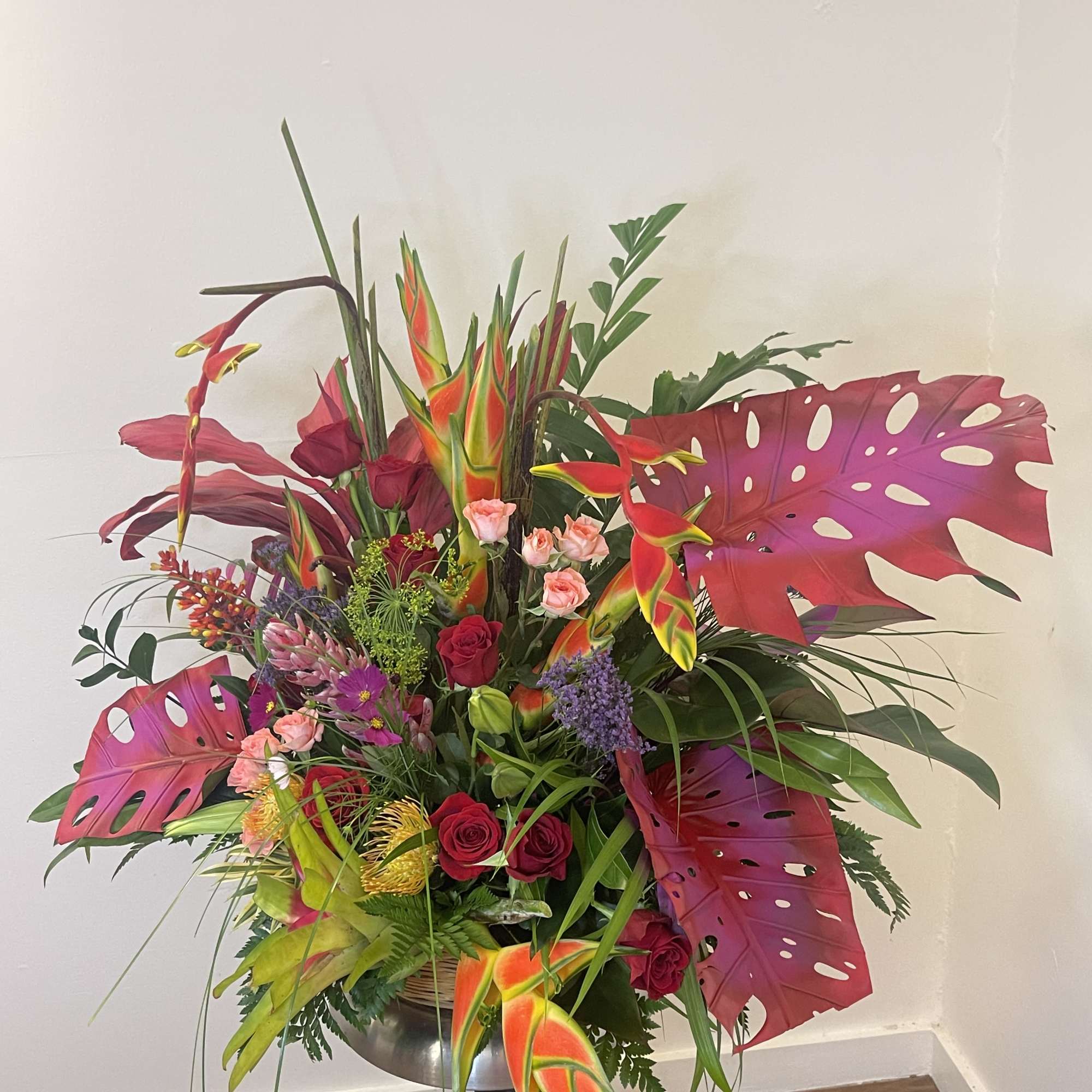 This exotic display of tropical blooms will blow your loved ones away