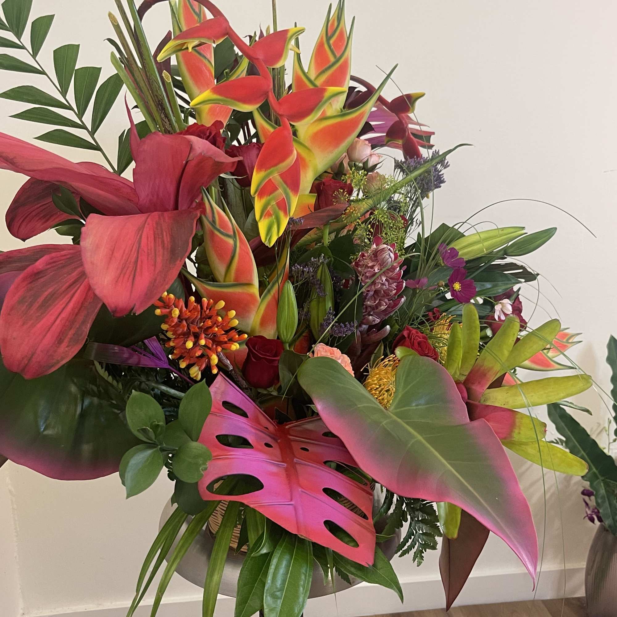 This exotic display of tropical blooms will blow your loved ones away