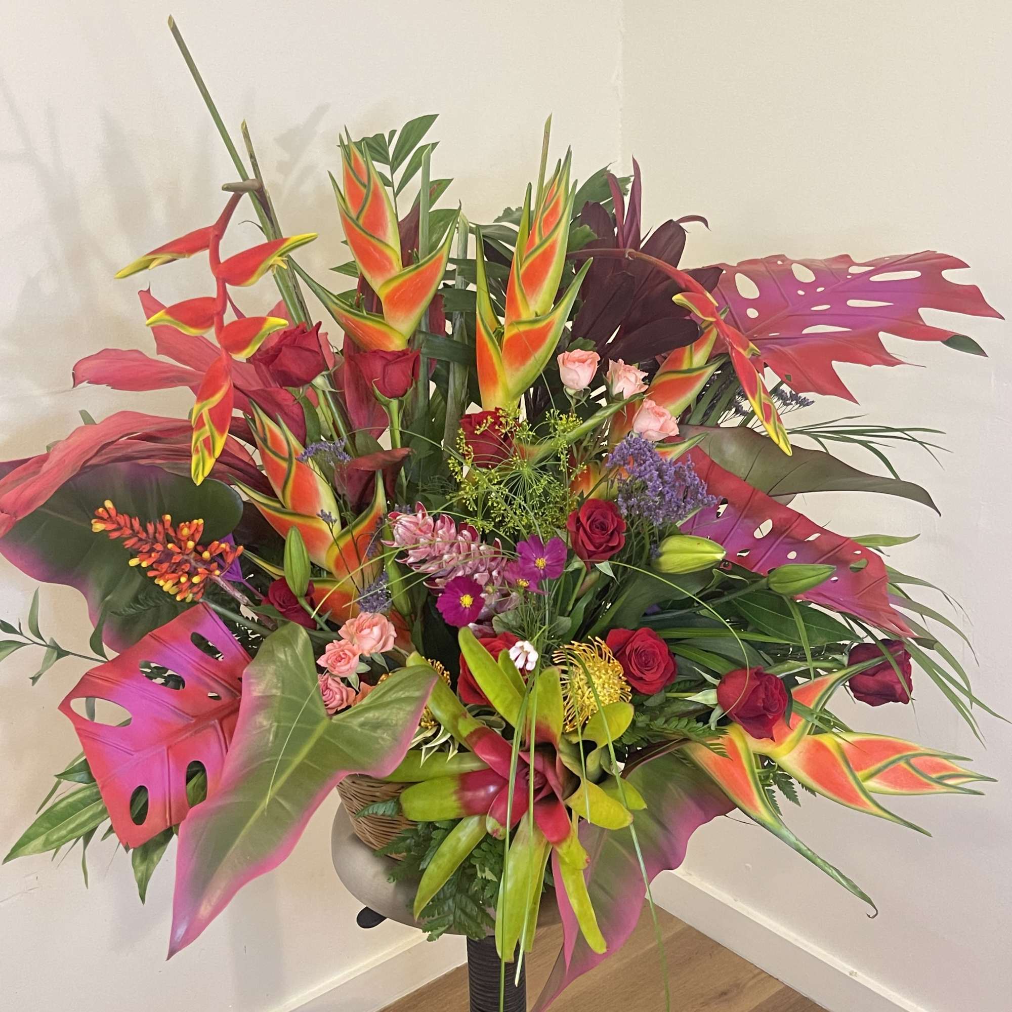 This exotic display of tropical blooms will blow your loved ones away