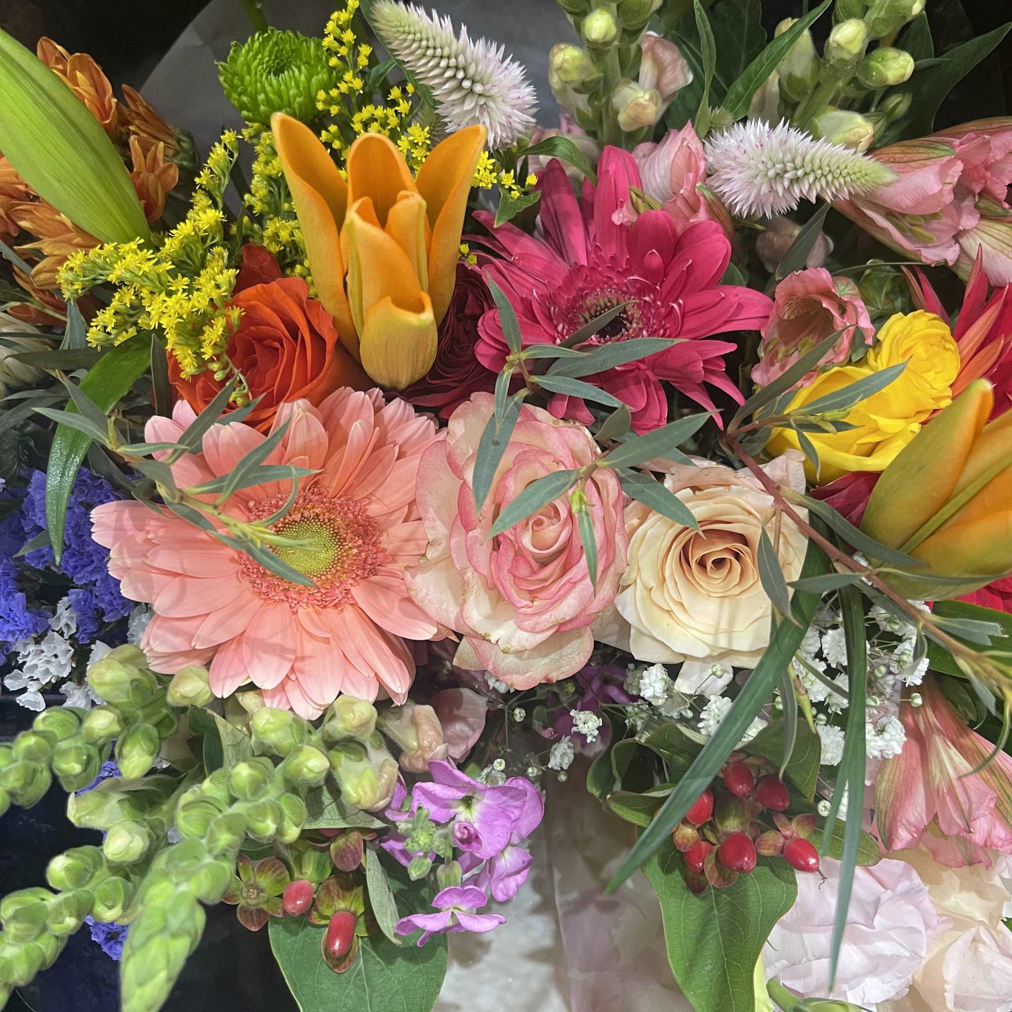 This colorful mixed floral bouquet is a fun arrangement packed with vibrant