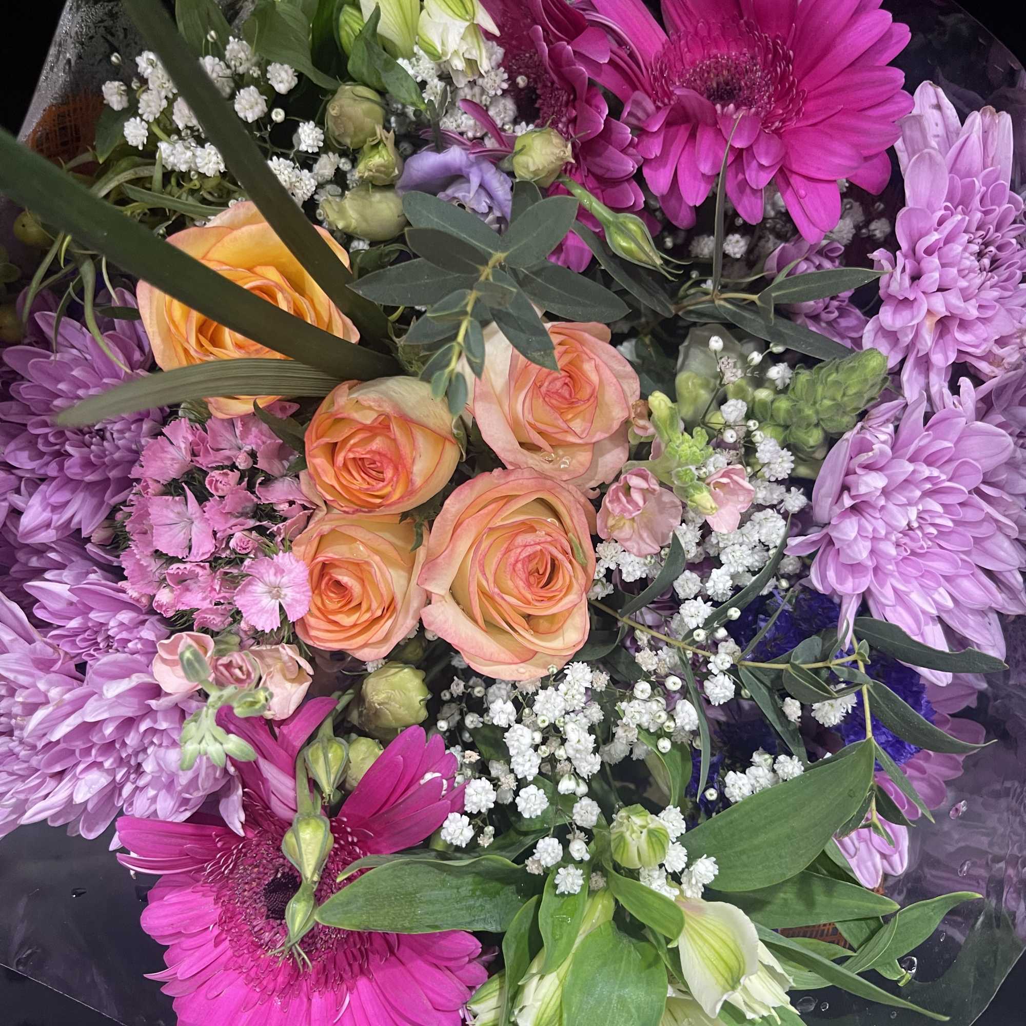 This colorful mixed floral bouquet is a fun arrangement packed with vibrant