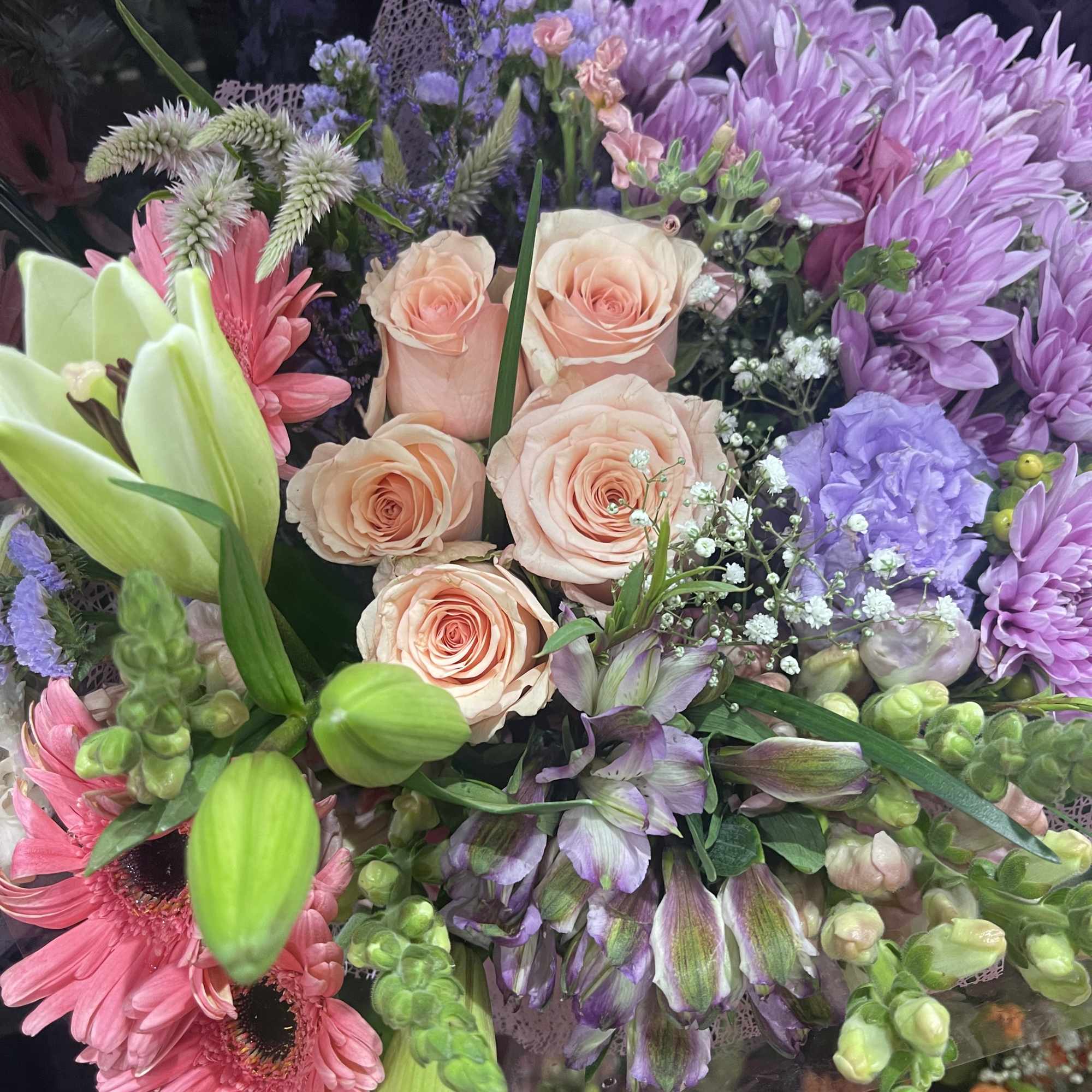 This colorful mixed floral bouquet is a fun arrangement packed with vibrant