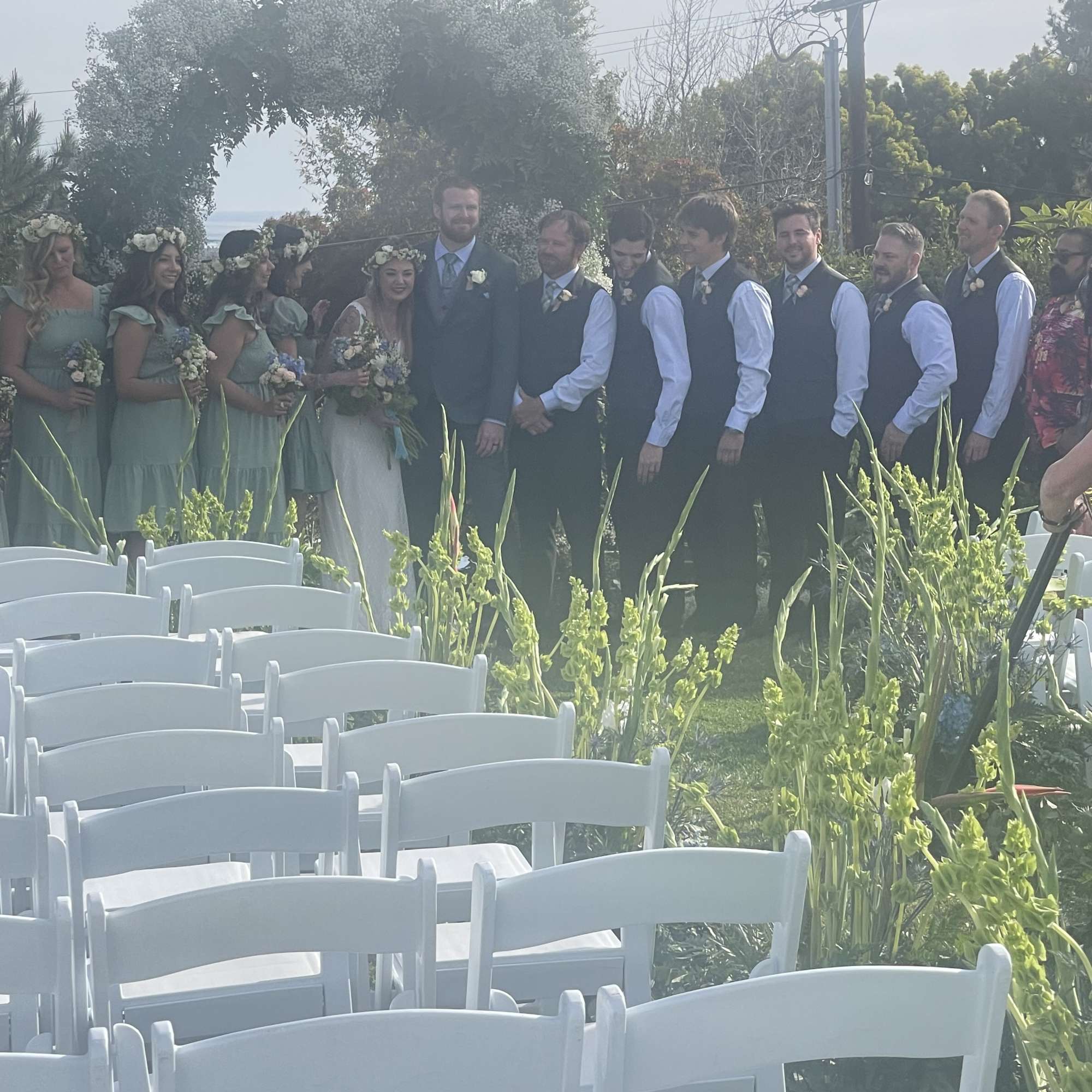 This wedding floral package includes florals down the aisle, a full flower