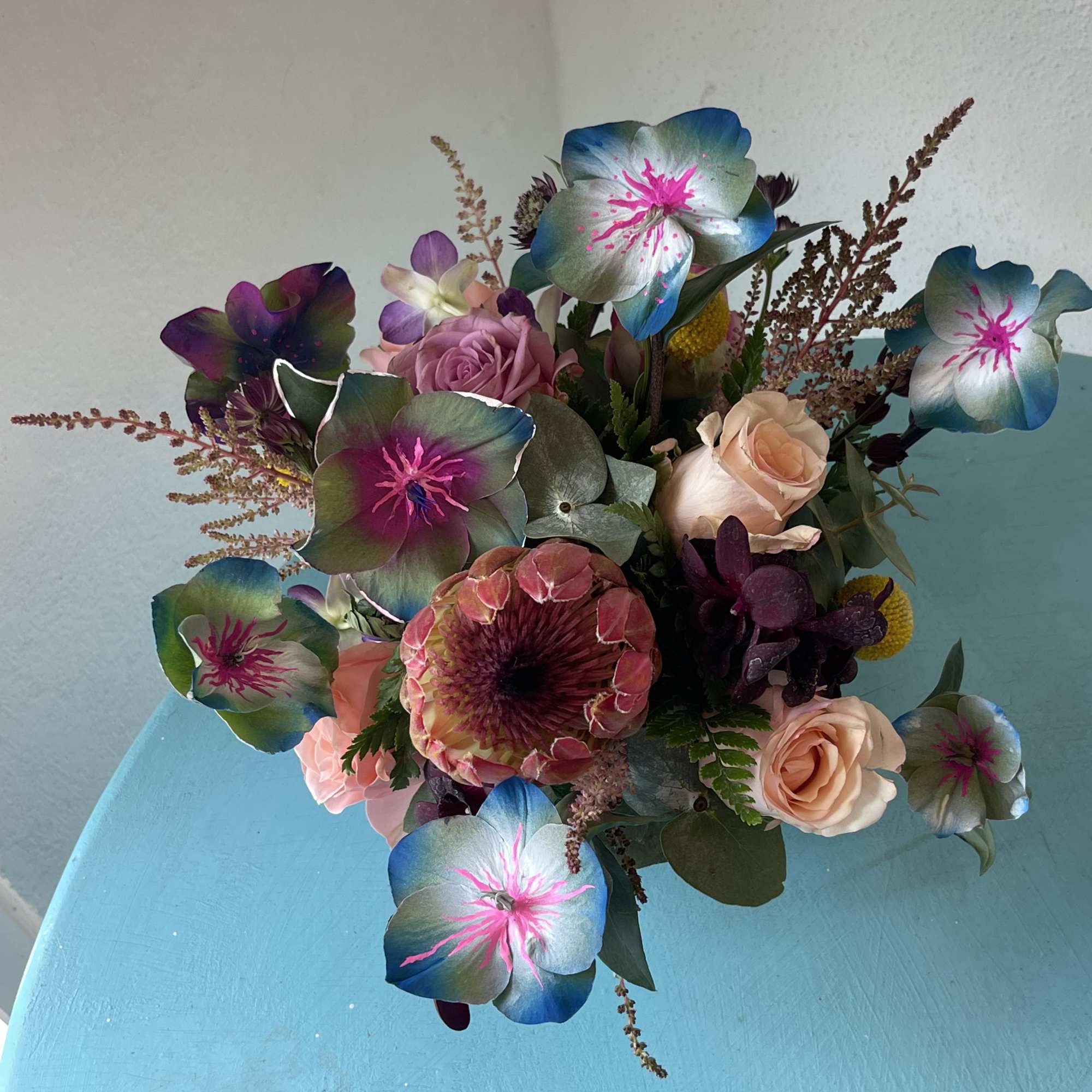 This impressive mix of hand painted foliage and florals Will take your
