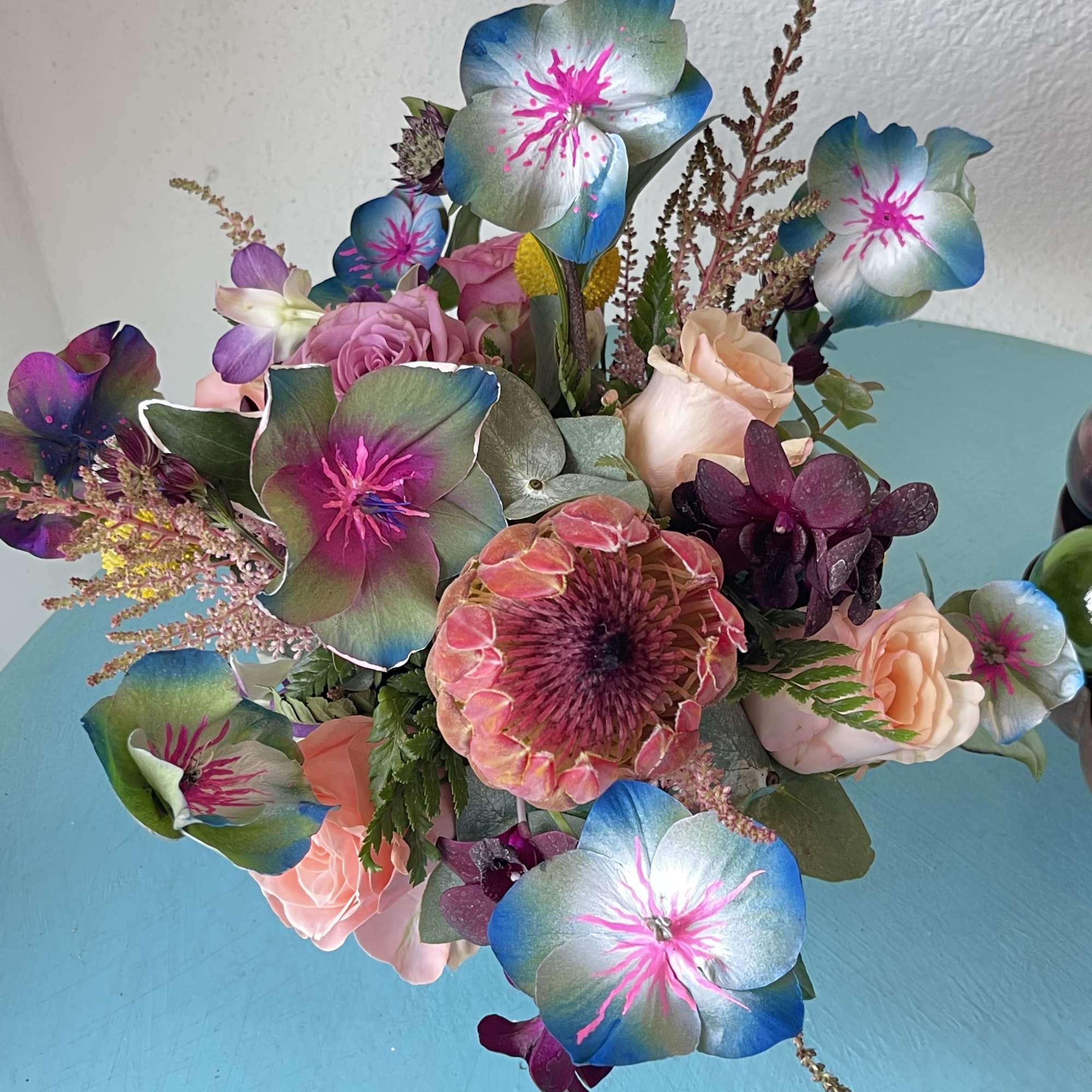 This impressive mix of hand painted foliage and florals Will take your