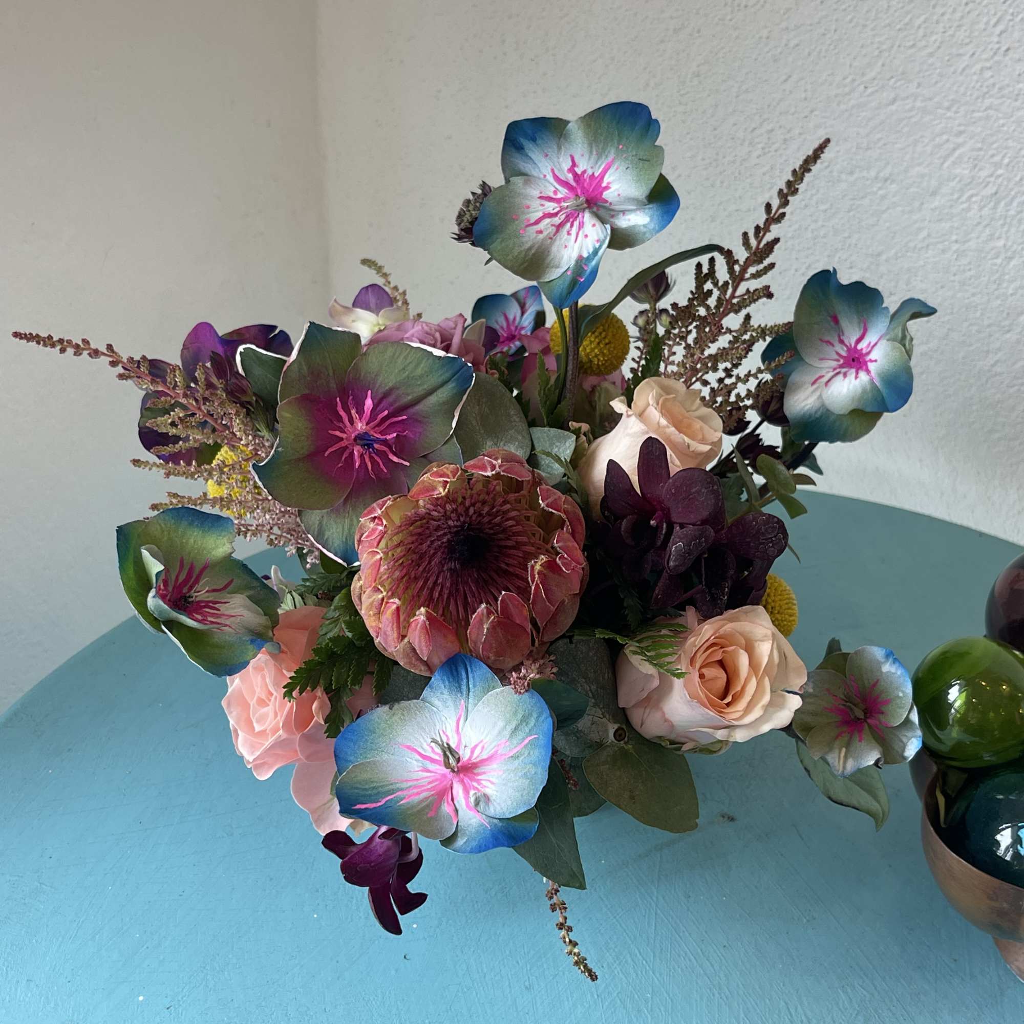 This impressive mix of hand painted foliage and florals Will take your