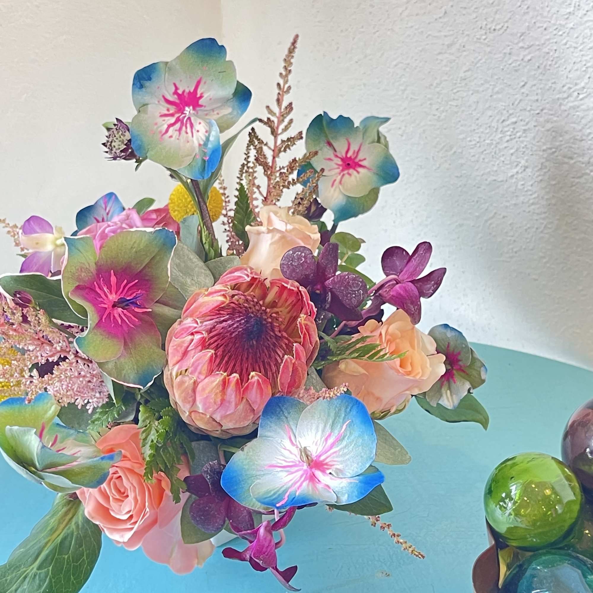 This impressive mix of hand painted foliage and florals Will take your