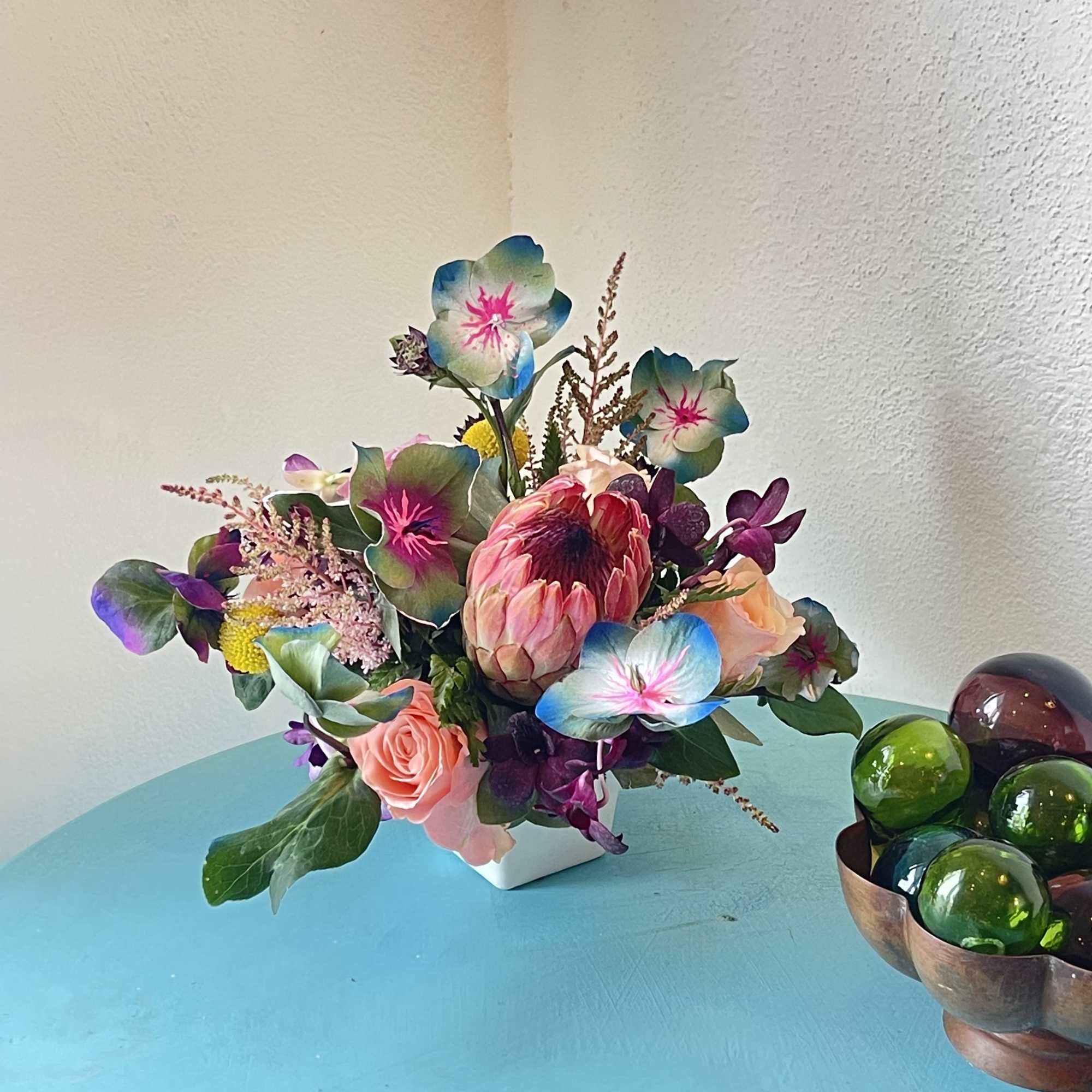 This impressive mix of hand painted foliage and florals Will take your