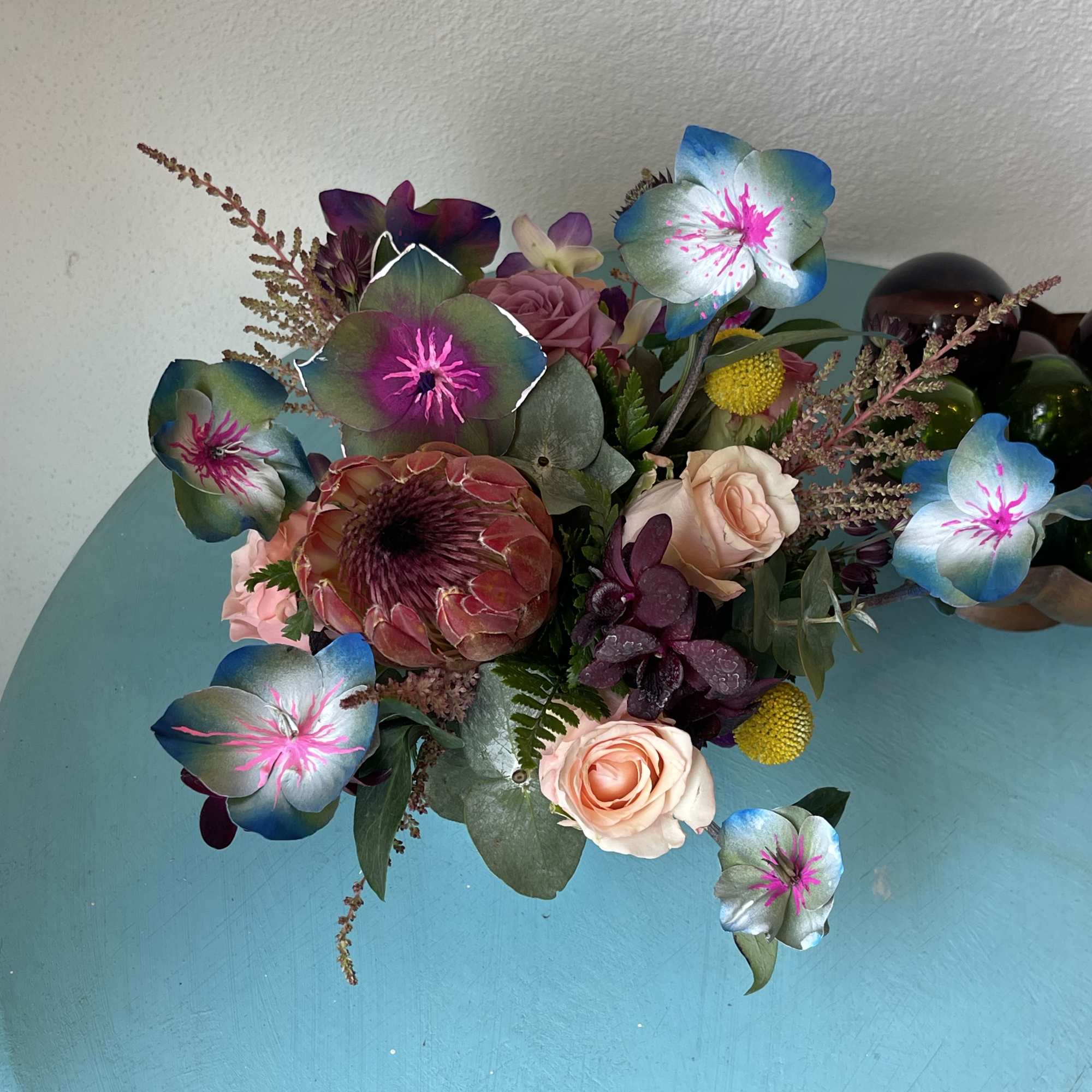 This impressive mix of hand painted foliage and florals Will take your