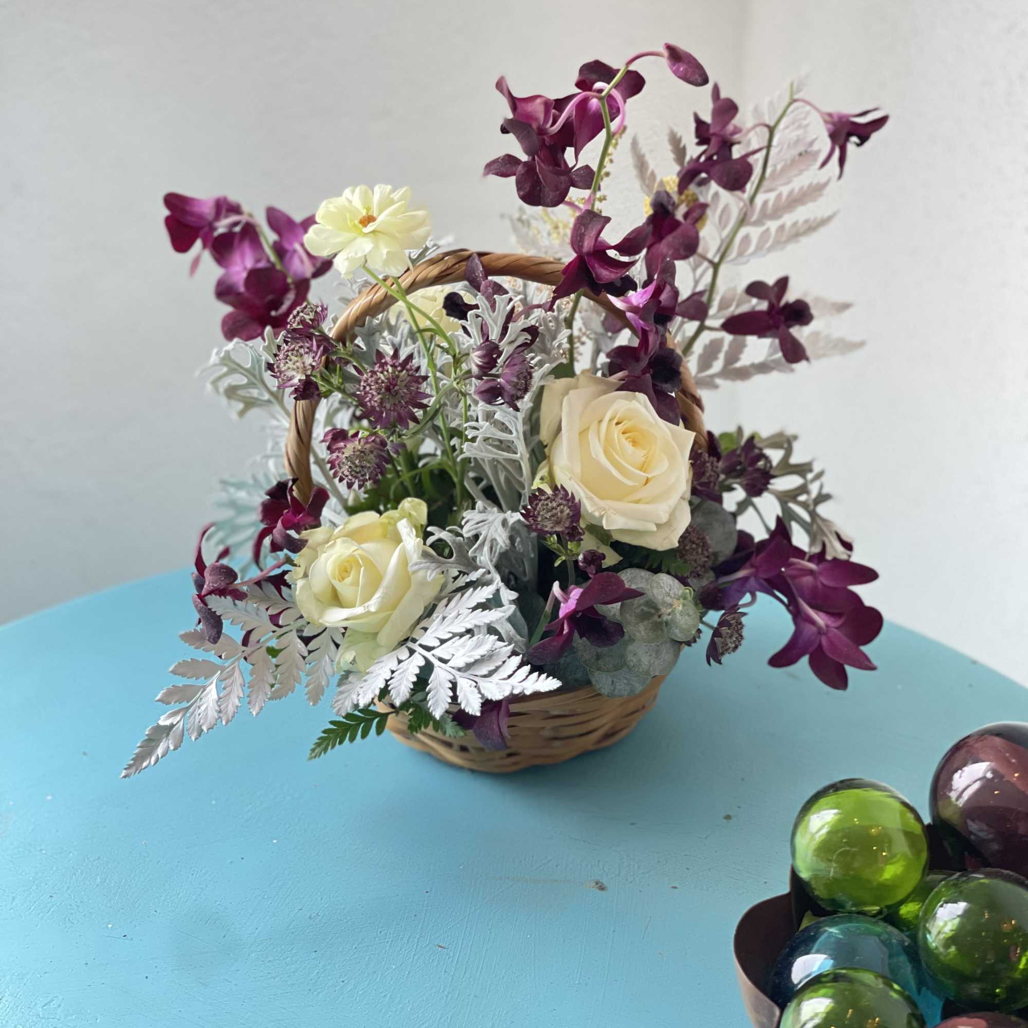 Dark purples, partnered with cream and white blooms. This exotic twist play